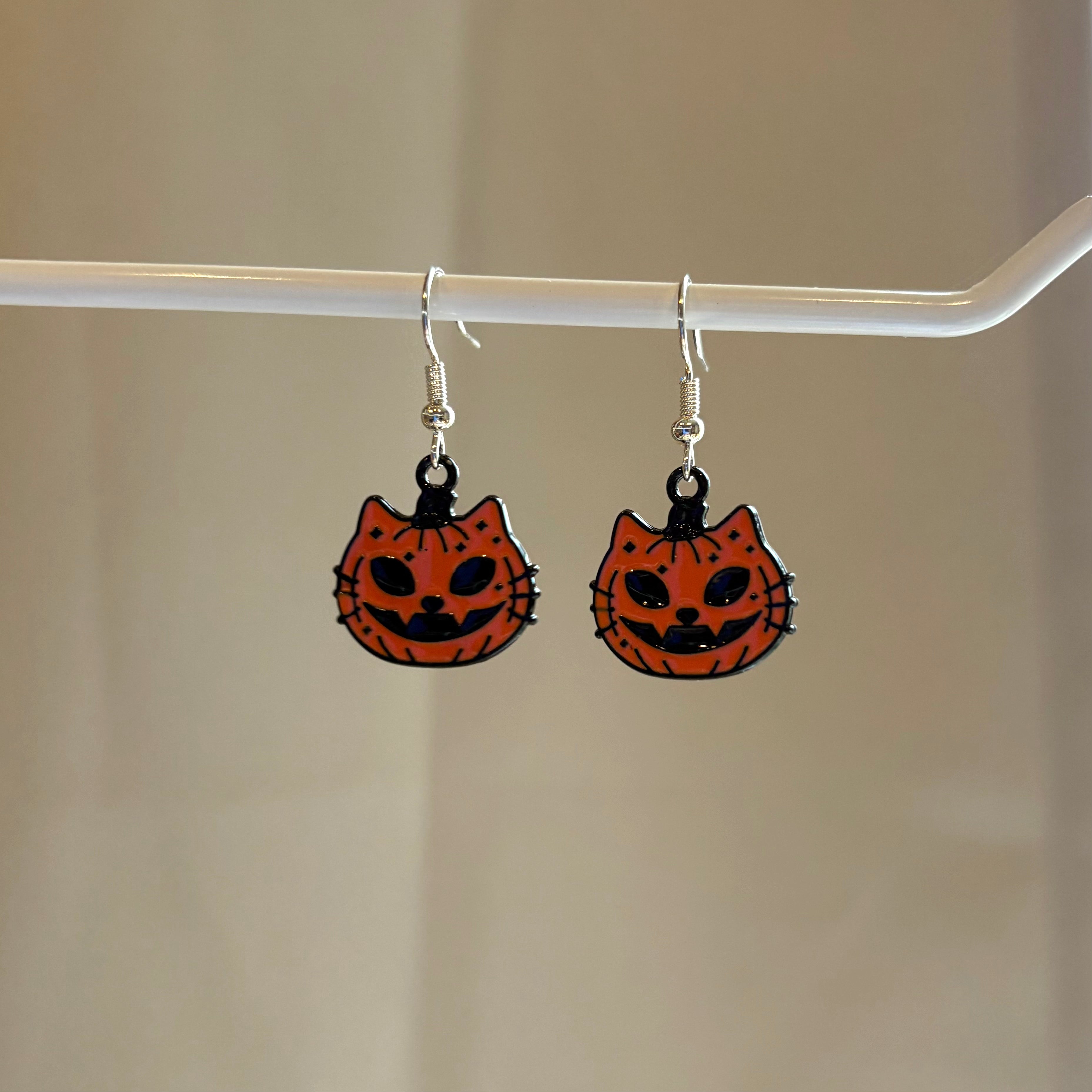 Cool orange pumpkin cat Halloween earrings on hypoallergenic surgical steel hooks