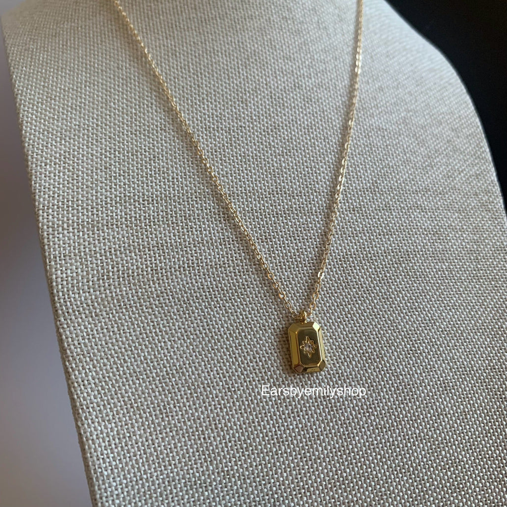 Gold plated rectangle pendant with white crystal diamanté necklace