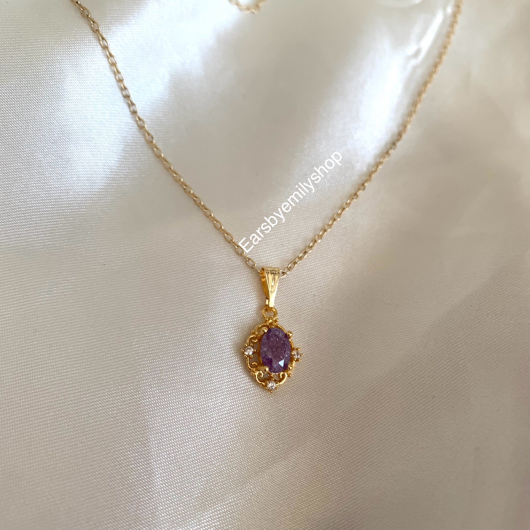 Gold plated purple crystal necklace