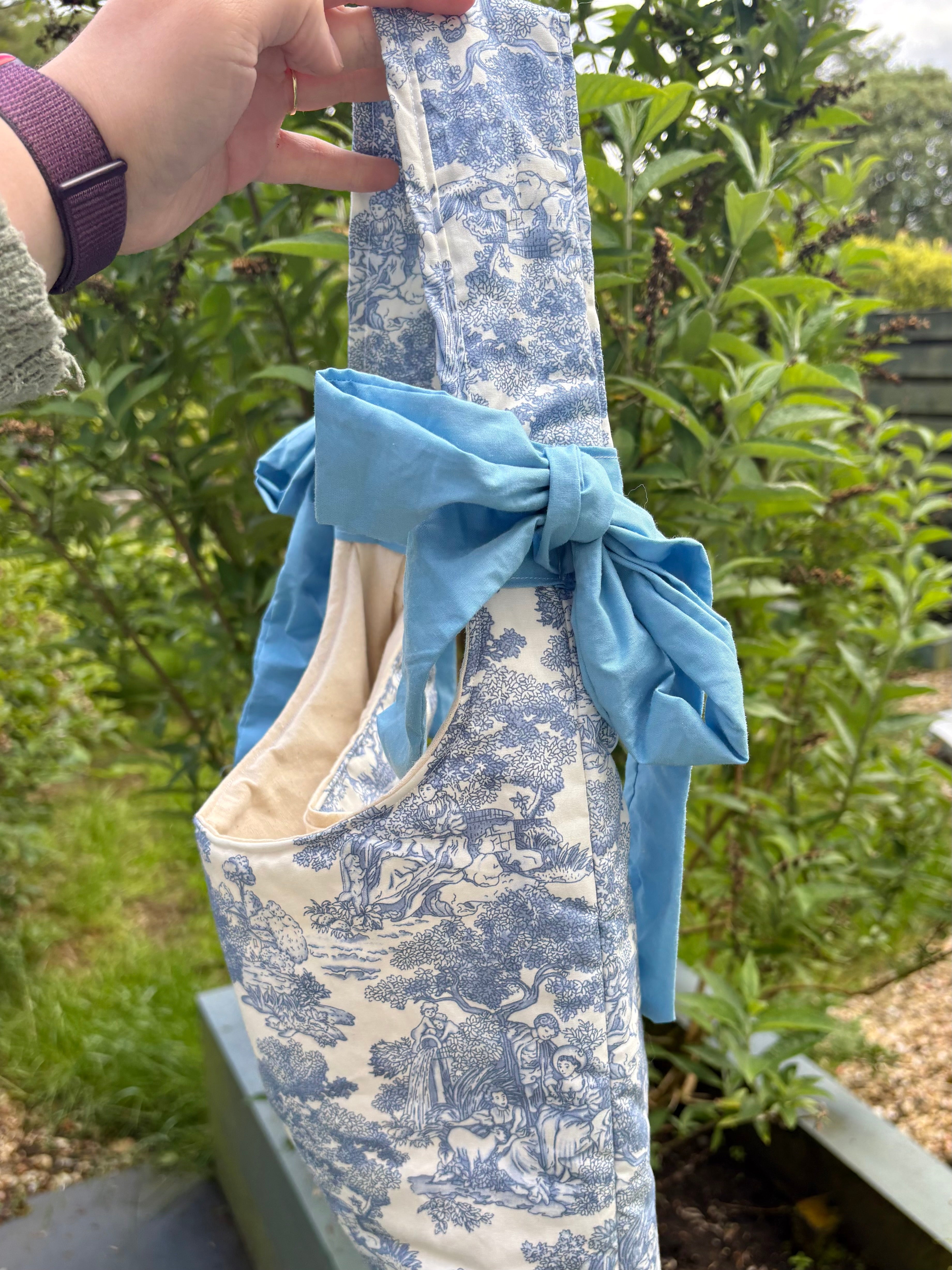 Handmade white and blue porcelain coquette farm print padded tote bag with blue bows