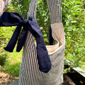 Handmade white and navy blue stripe coquette padded tote bag with bows
