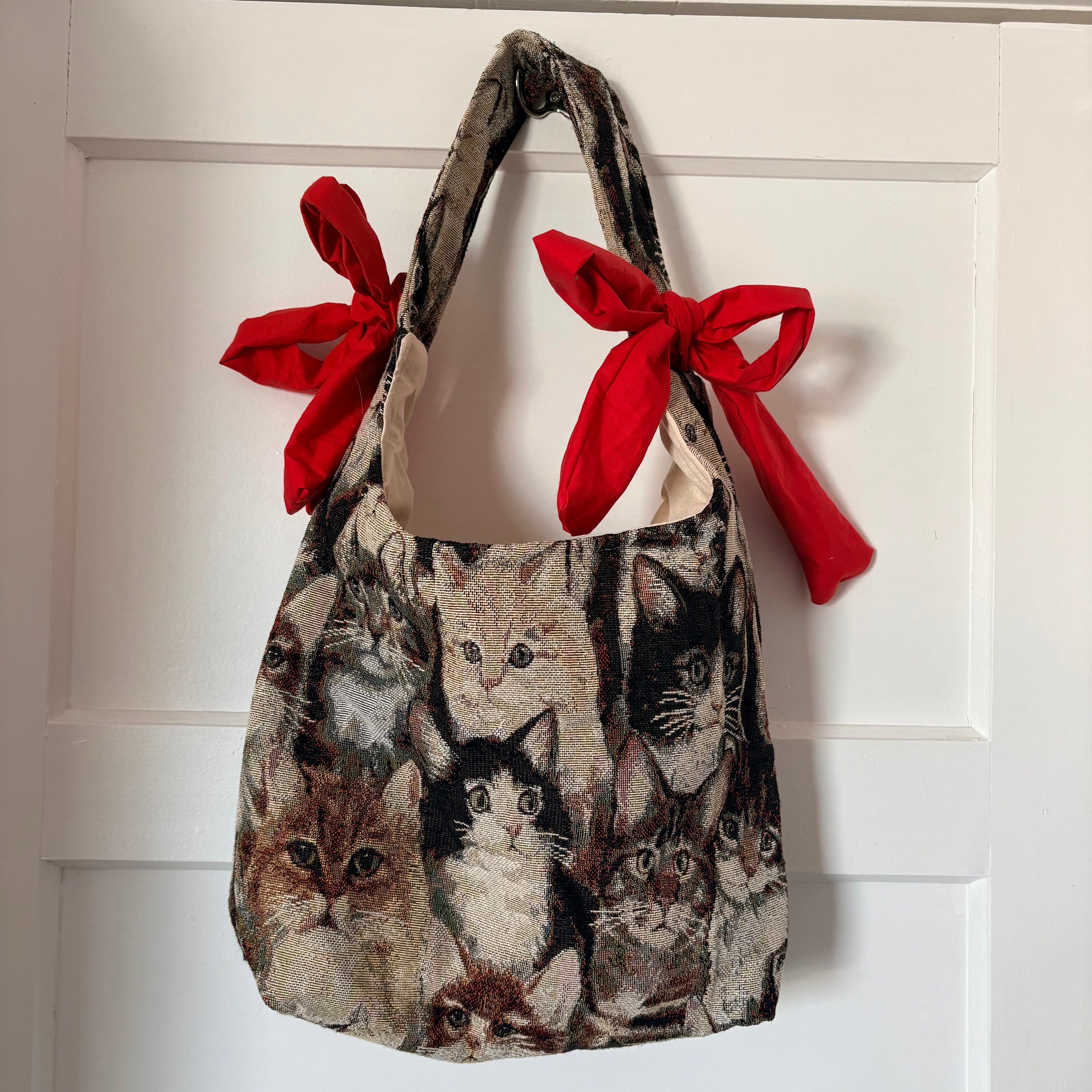 Handmade cool cat tapestry with red bow tote bag