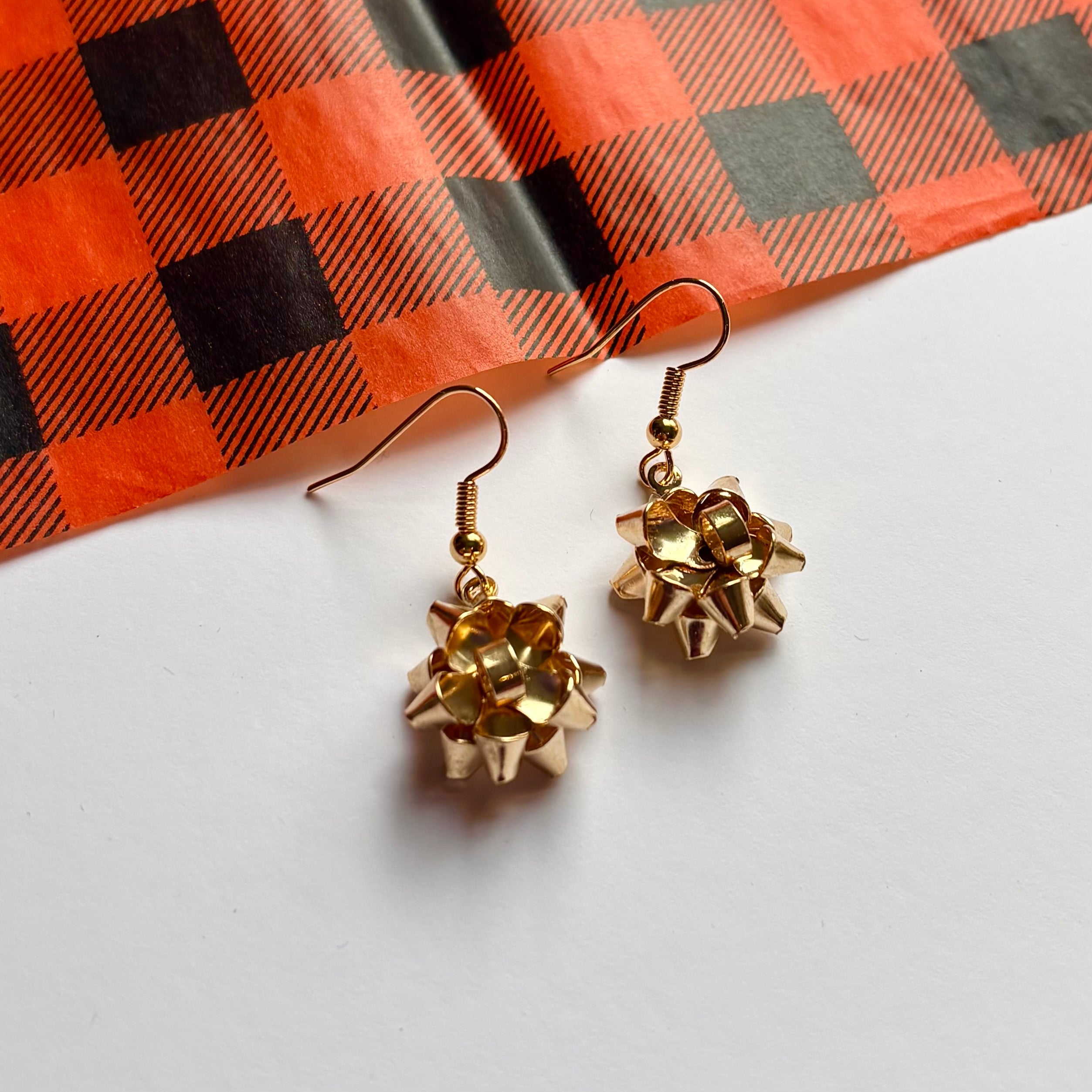 Colourful dangle Christmas fun quirky present bow earrings