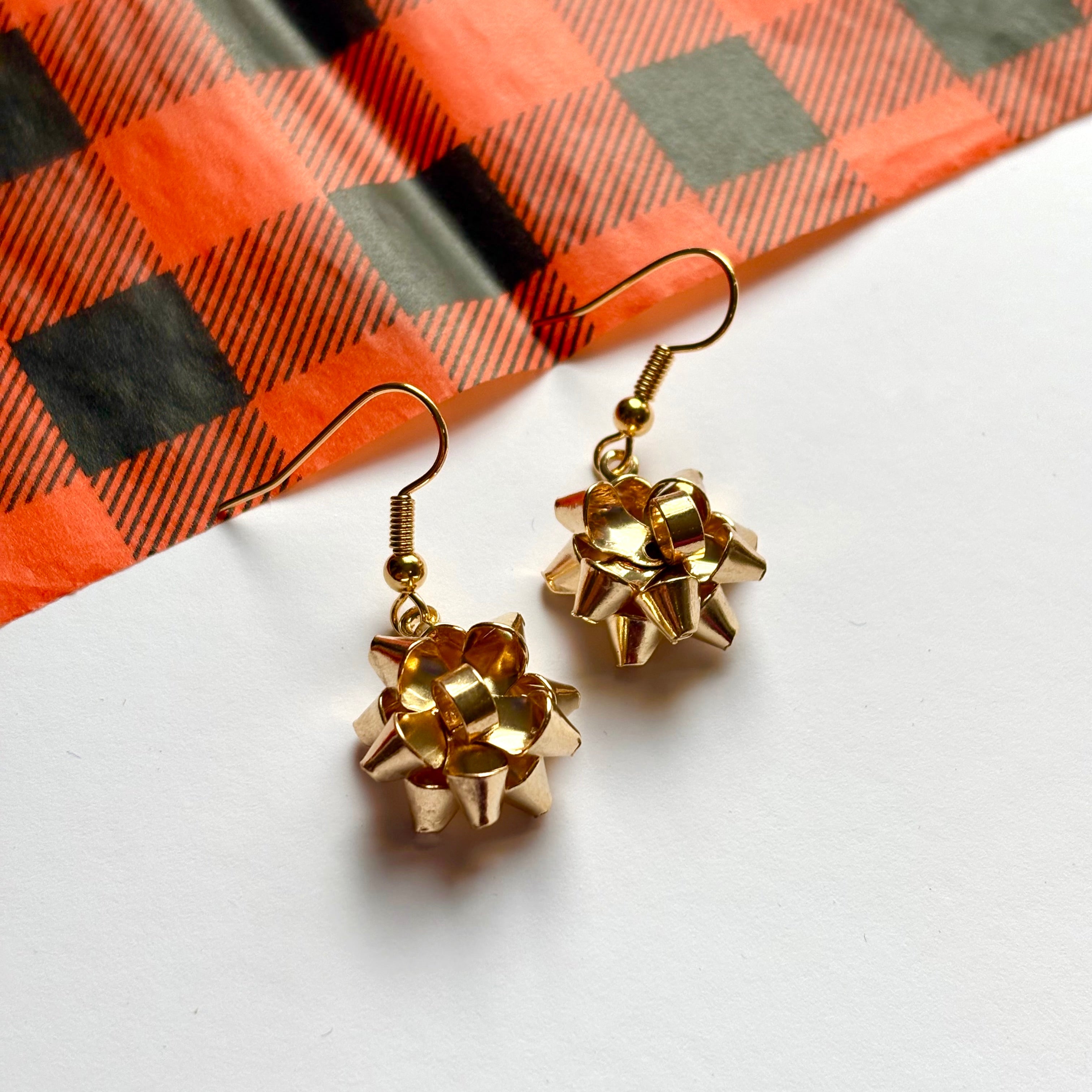 Colourful dangle Christmas fun quirky present bow earrings