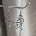 Stainless steel silver fairy wing dangle earrings with blue aquamarine crystals