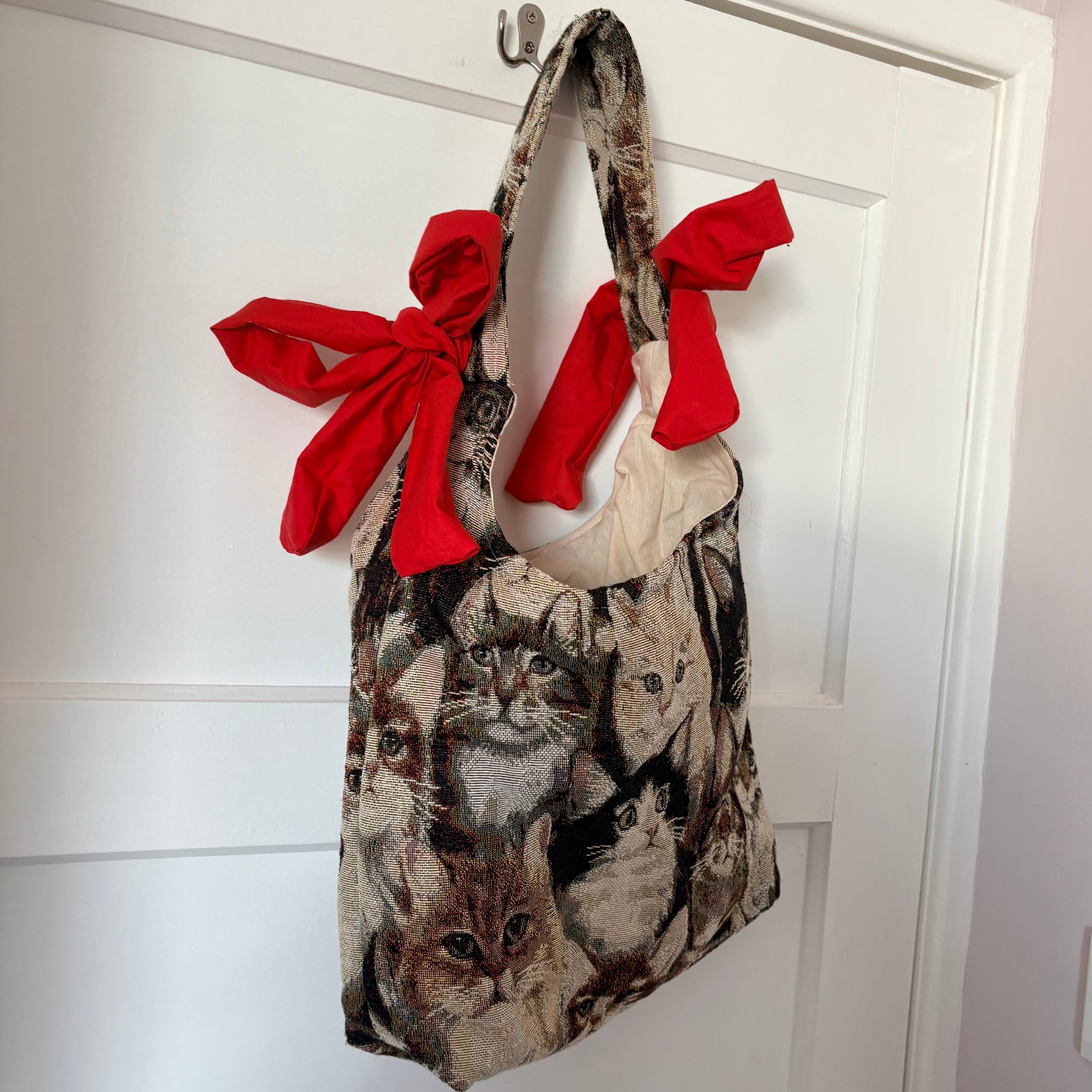 Handmade cool cat tapestry with red bow tote bag