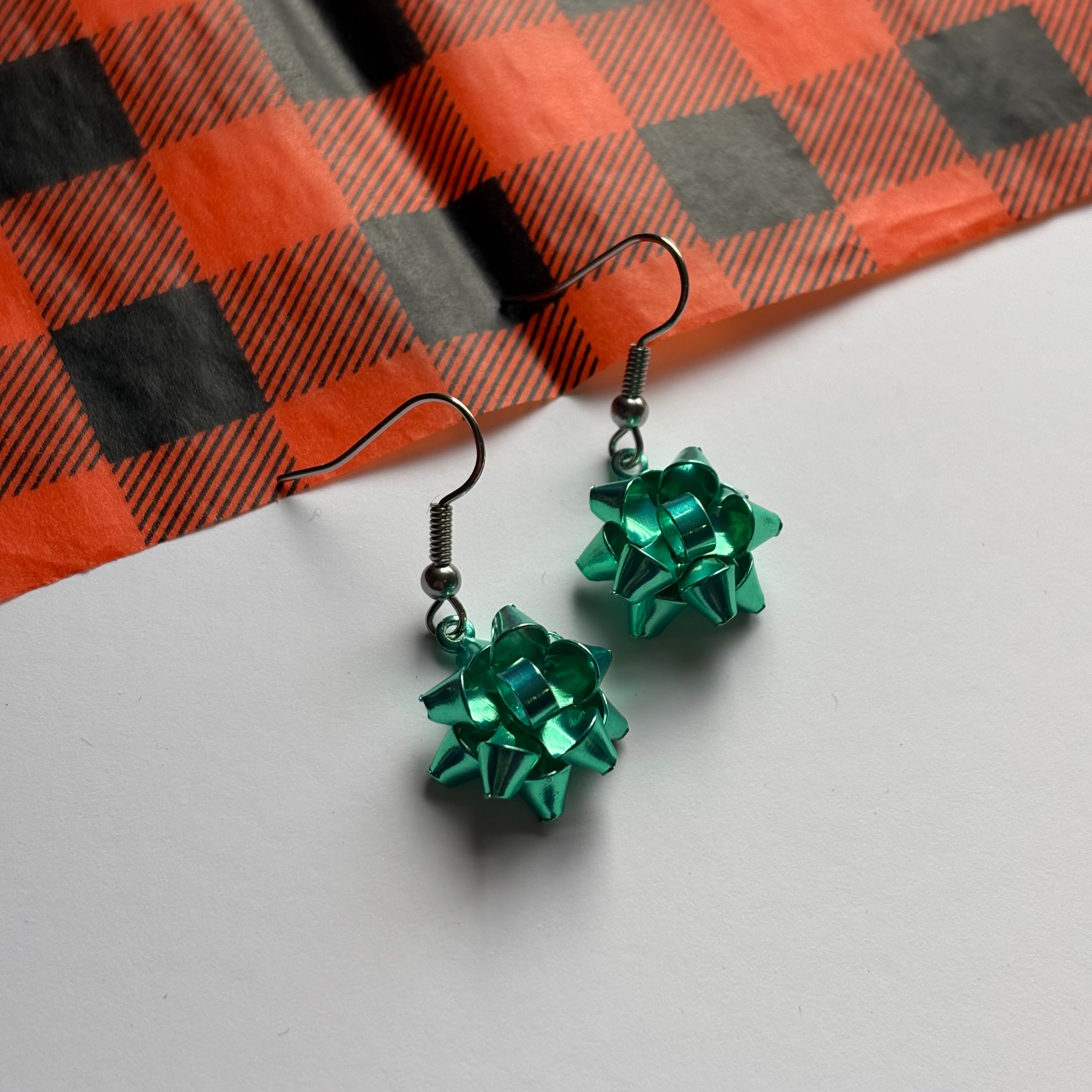 Colourful dangle Christmas fun quirky present bow earrings