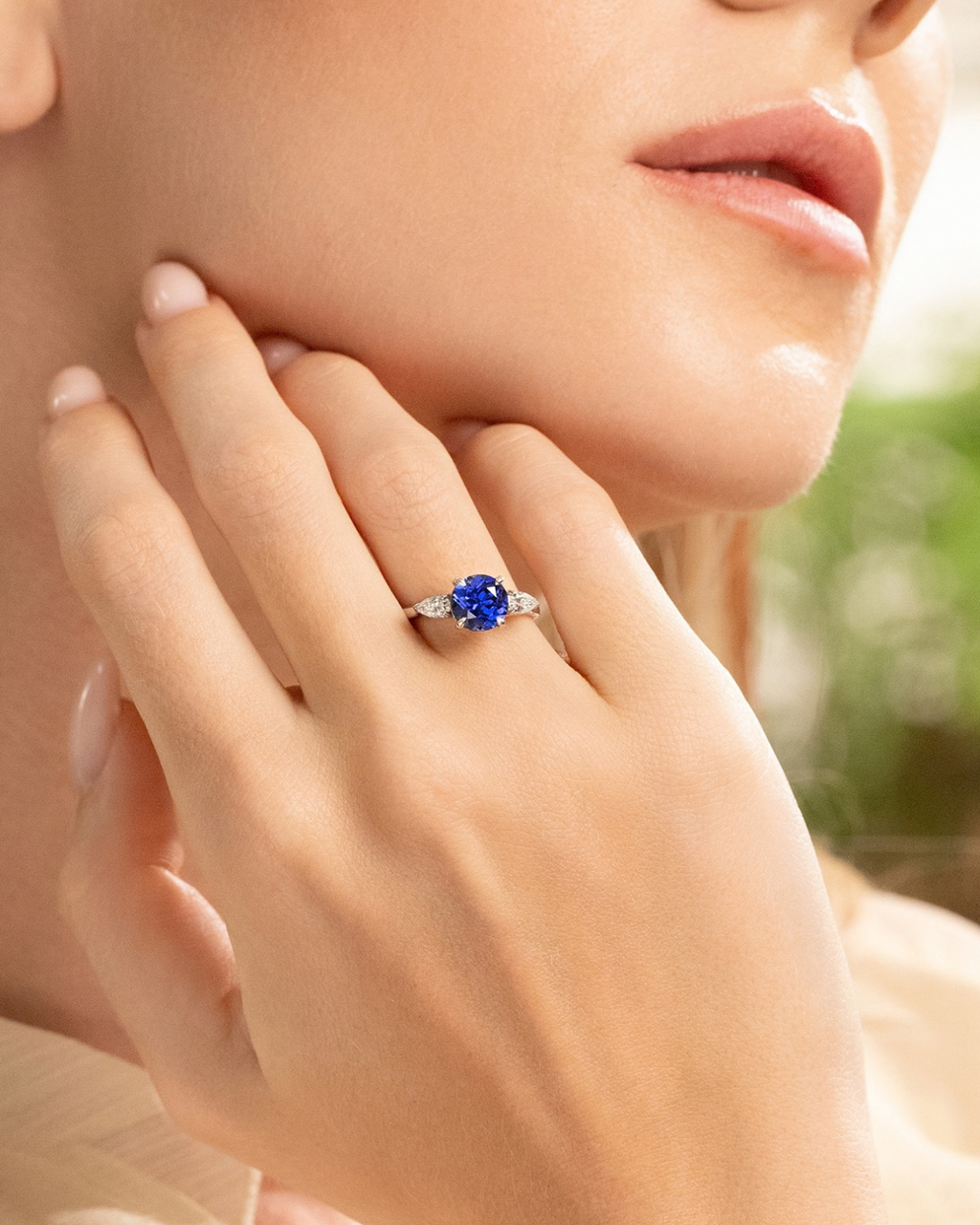 Blue Sapphire Round Cut Three Stone Engagement Ring in Sterling Silver