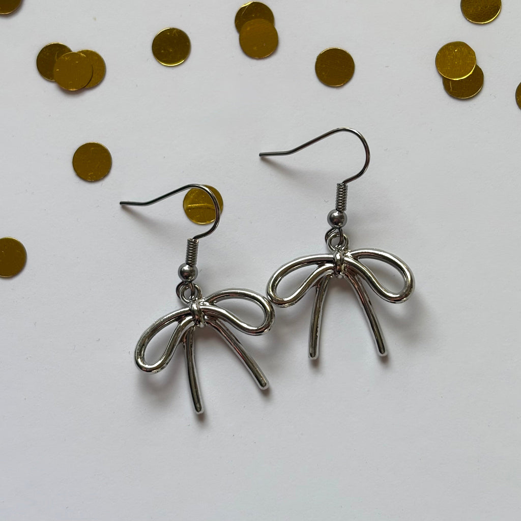 Cool gold or silver dangle bow earrings