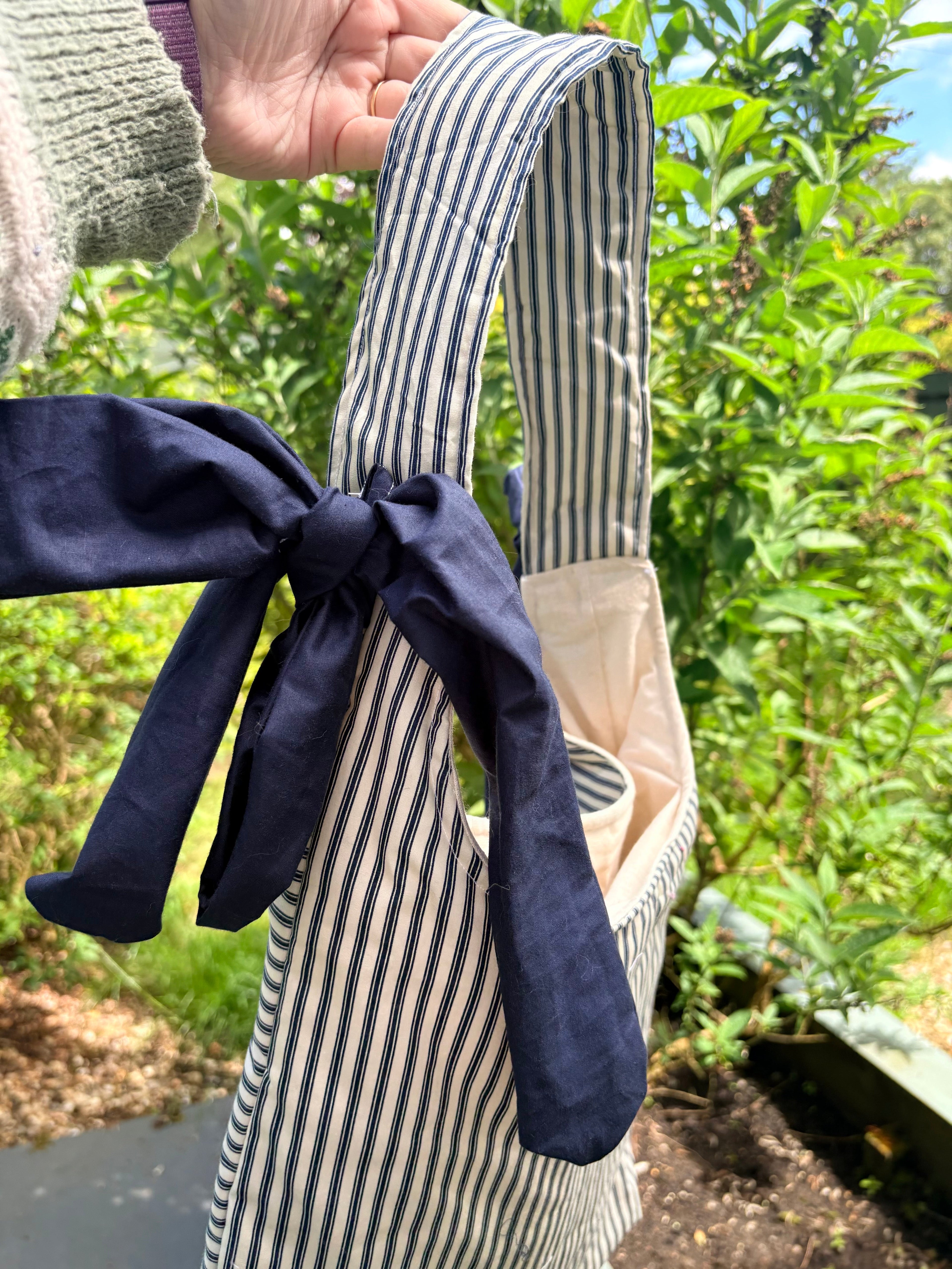 Handmade white and navy blue stripe coquette padded tote bag with bows