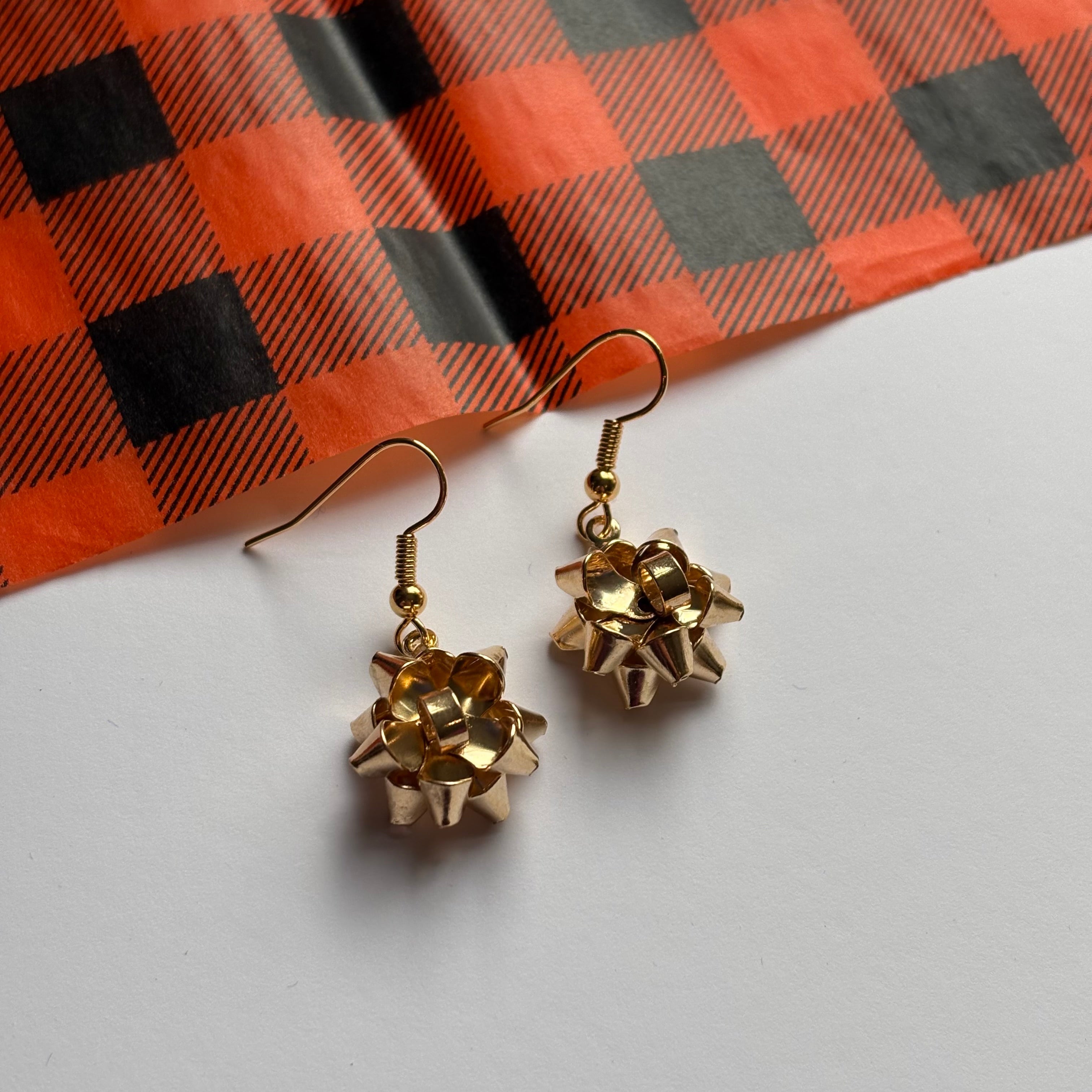 Colourful dangle Christmas fun quirky present bow earrings