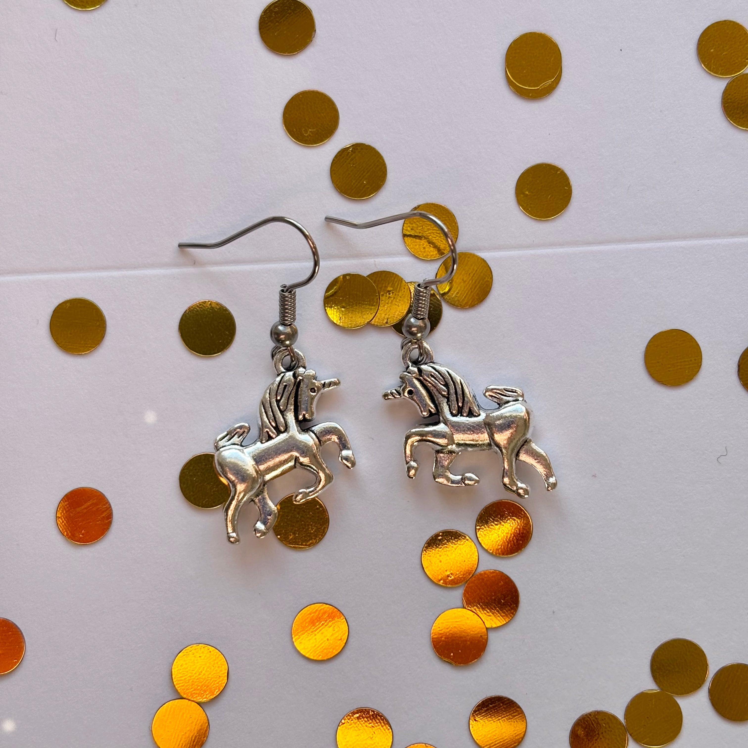 Silver Scottish unicorn earrings