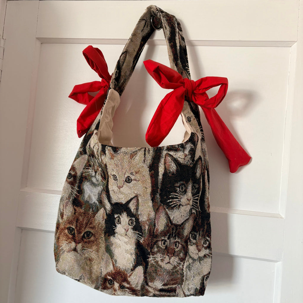 Handmade cool cat tapestry with red bow tote bag