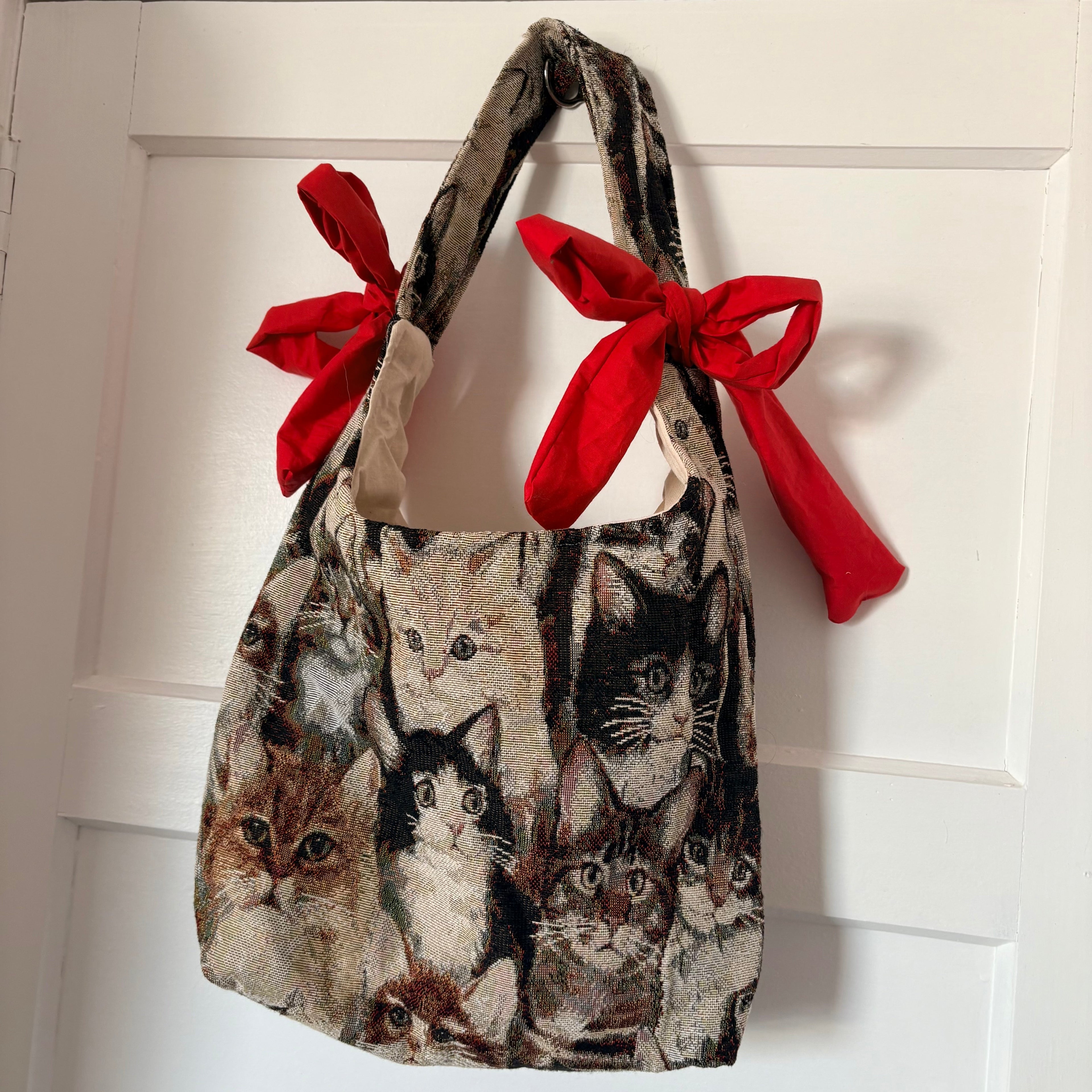 Handmade cool cat tapestry with red bow tote bag