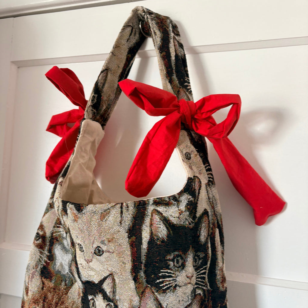 Handmade cool cat tapestry with red bow tote bag