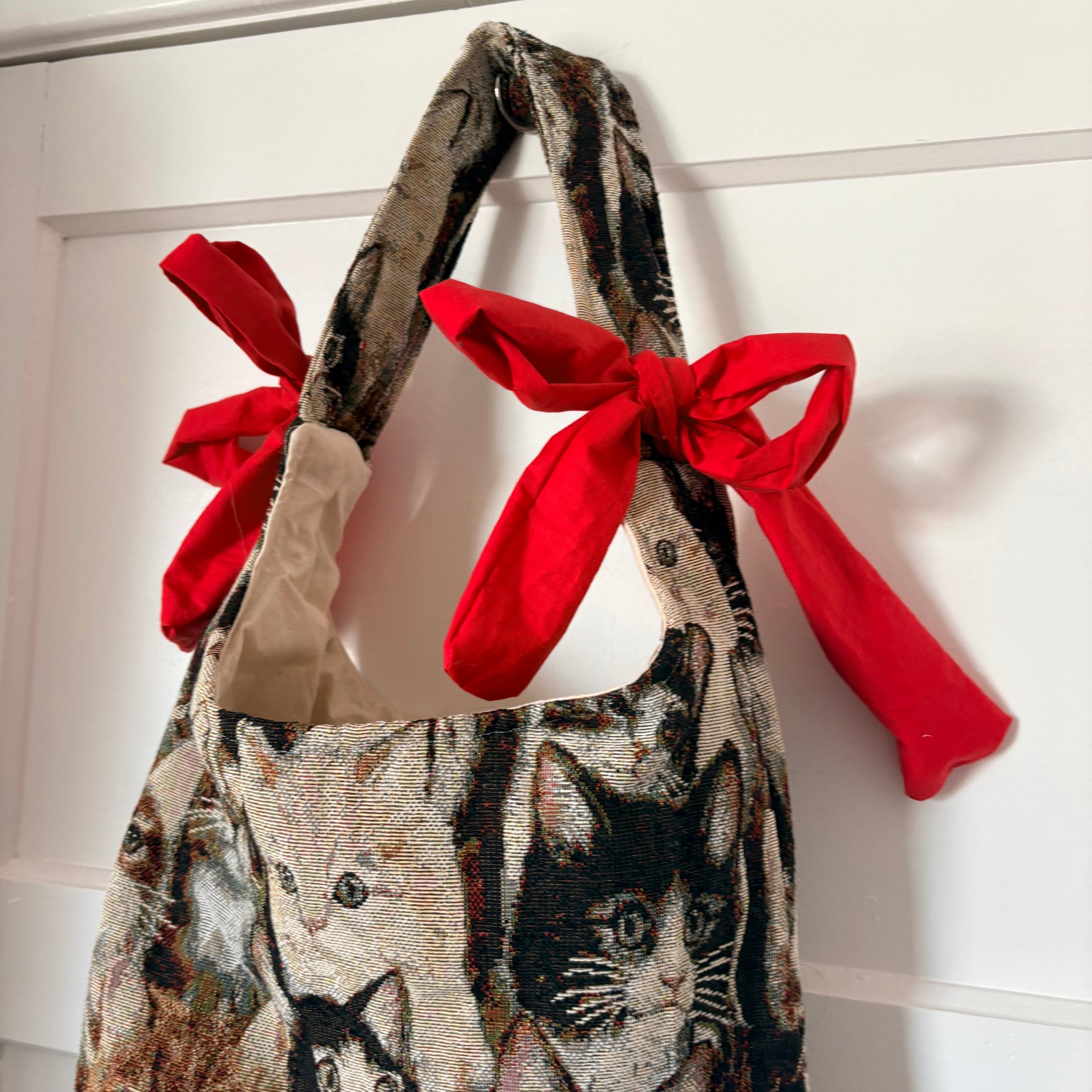 Handmade cool cat tapestry with red bow tote bag