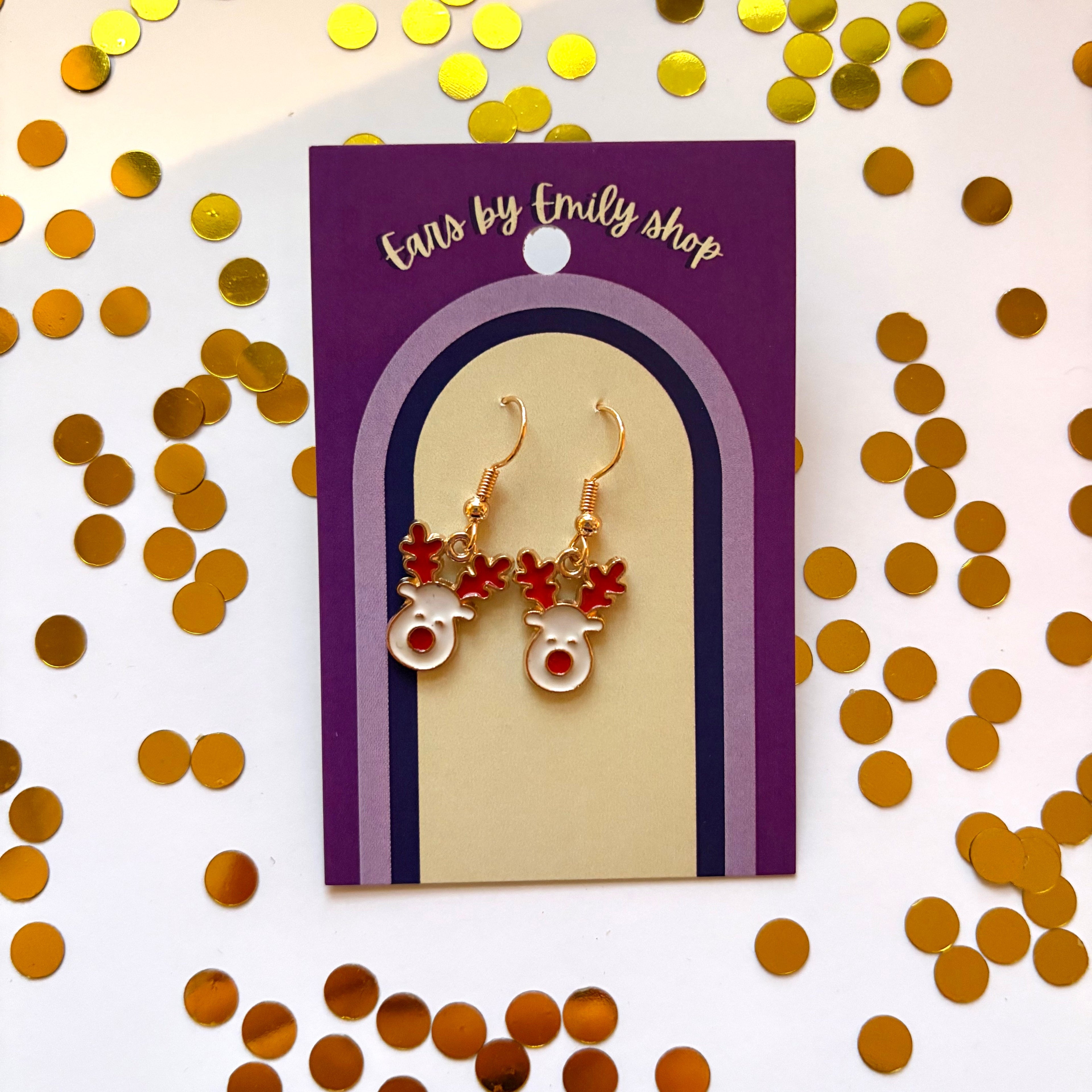 White and red reindeer gold dangle christmas earrings