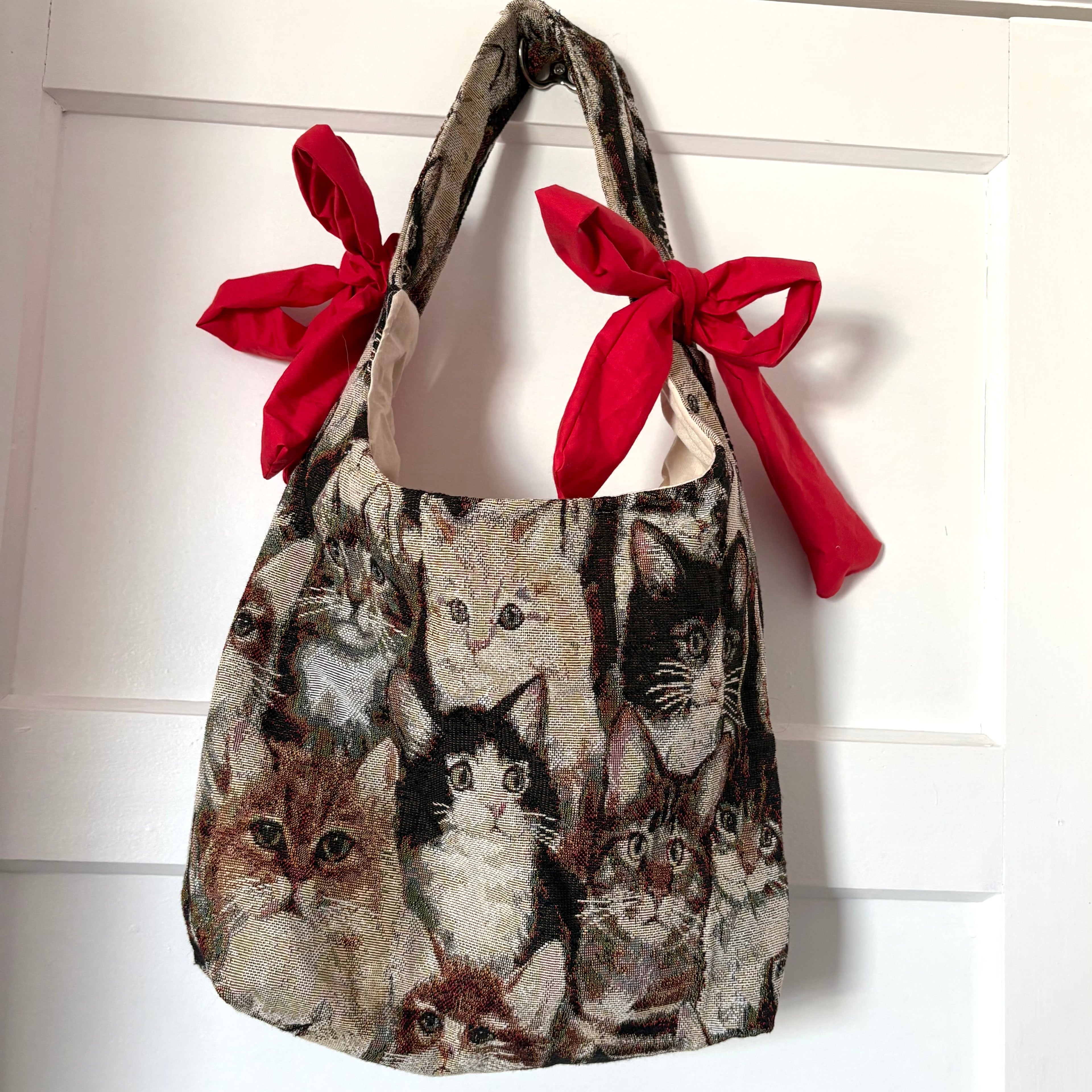 Handmade cool cat tapestry with red bow tote bag