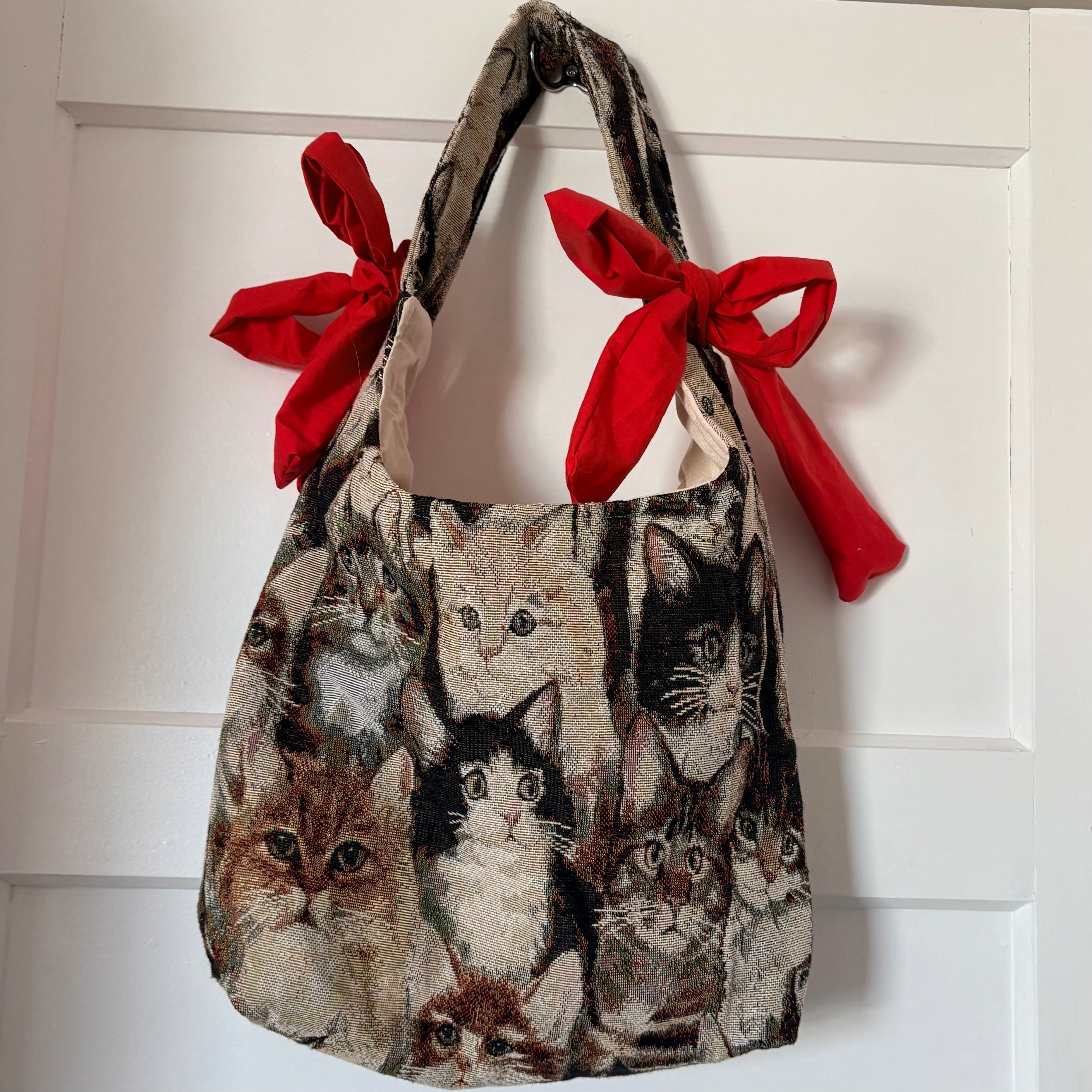 Handmade cool cat tapestry with red bow tote bag