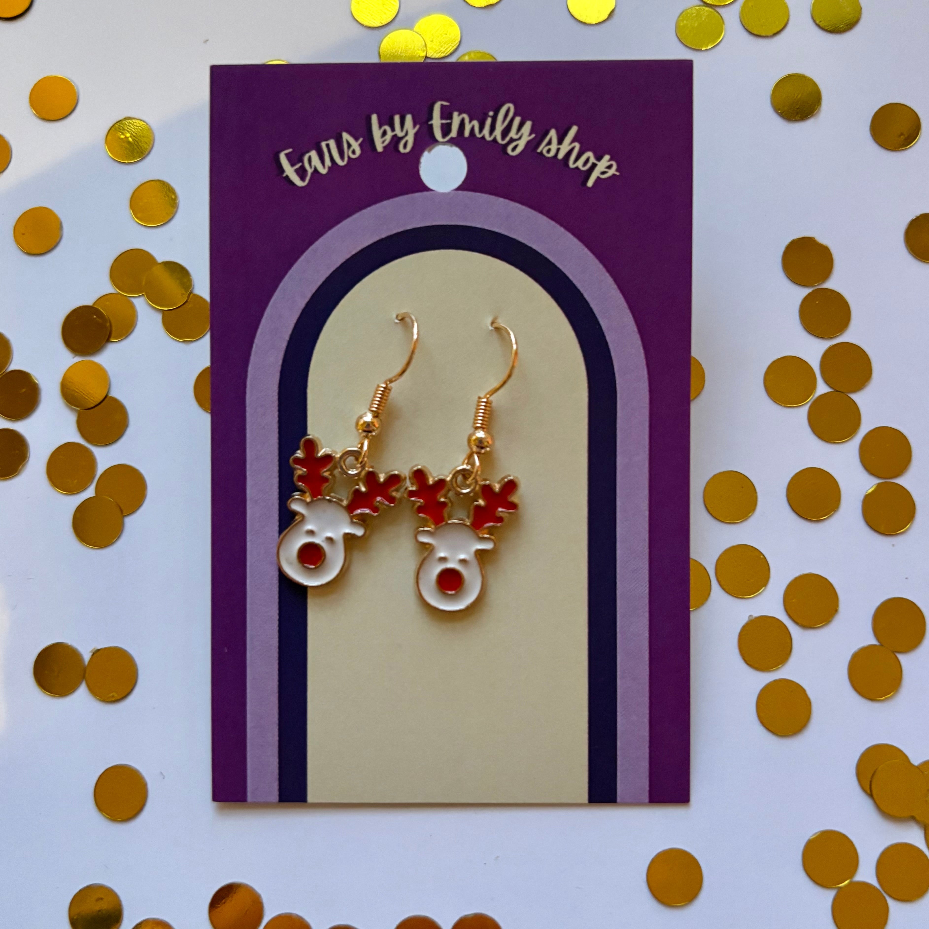 White and red reindeer gold dangle christmas earrings