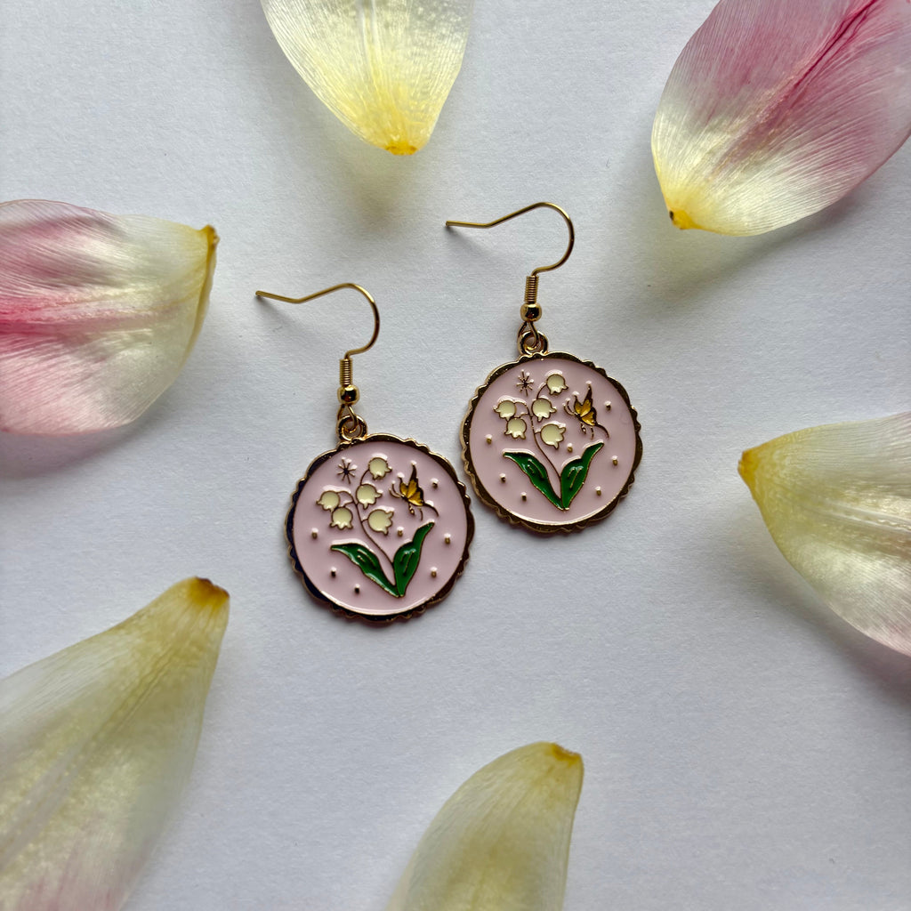 Pink circle with flowers and butterfly dangle gold earrings