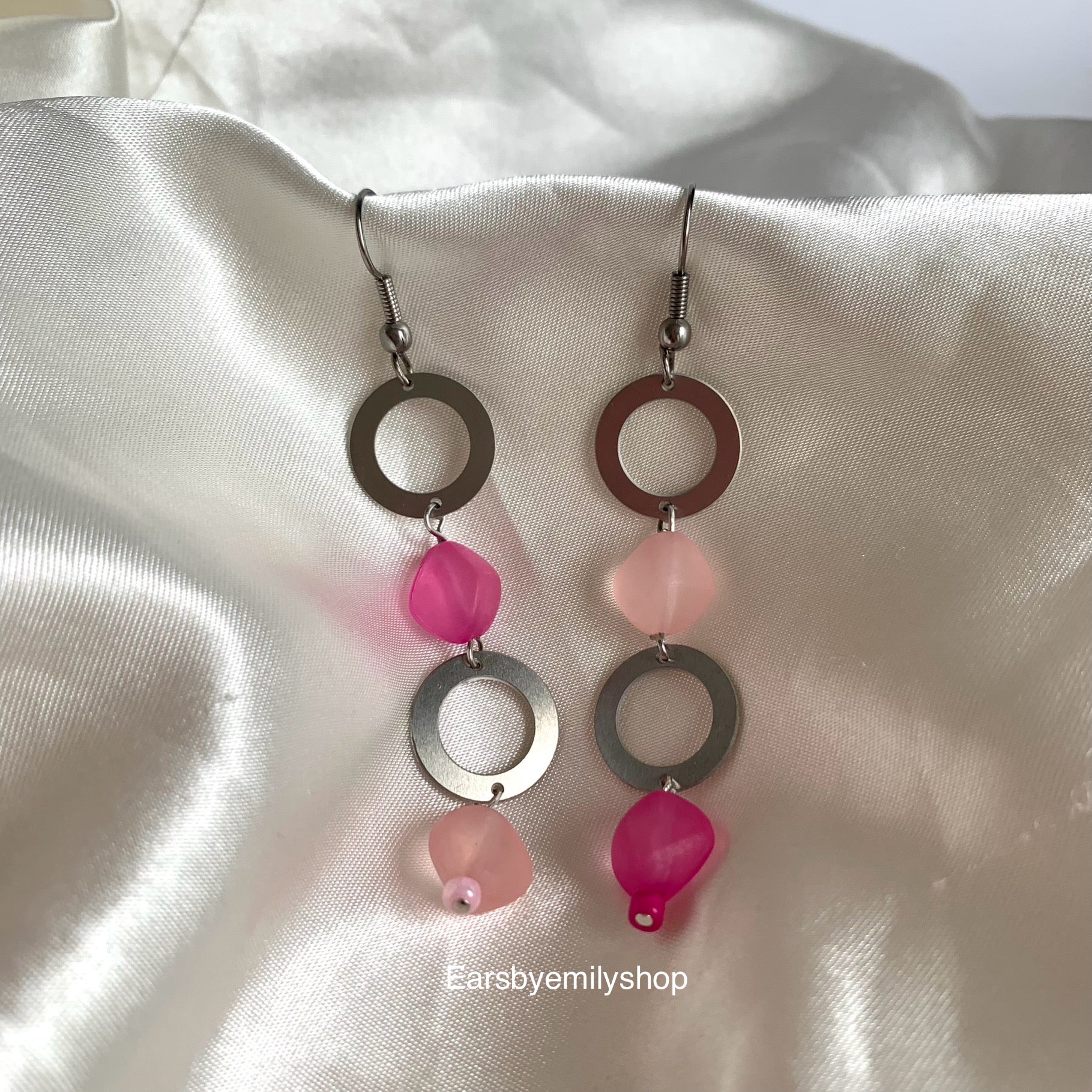 Stainless steel circle and asymmetrical pink bead statement dangle earrings