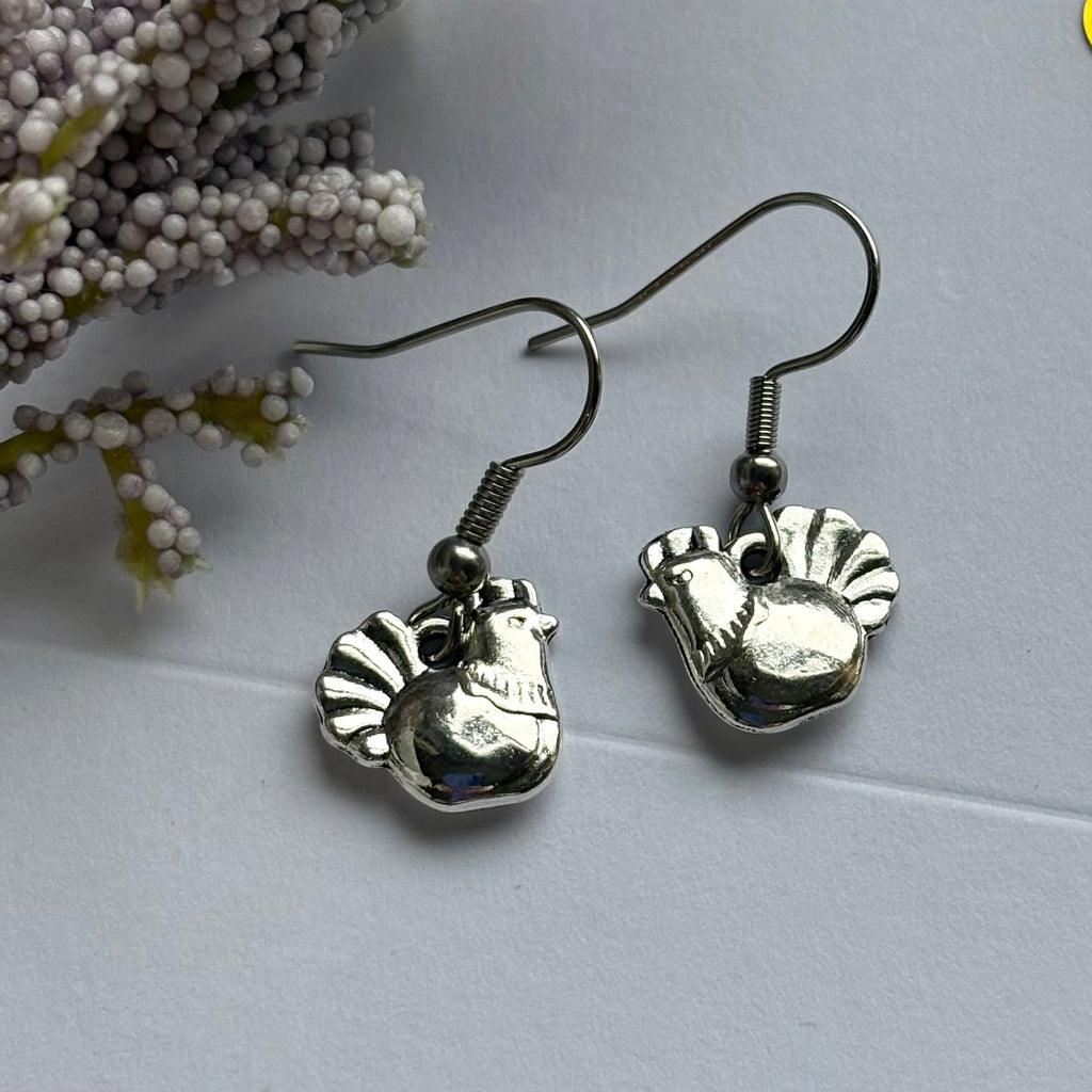 Silver chicken earrings on hypoallergenic hooks