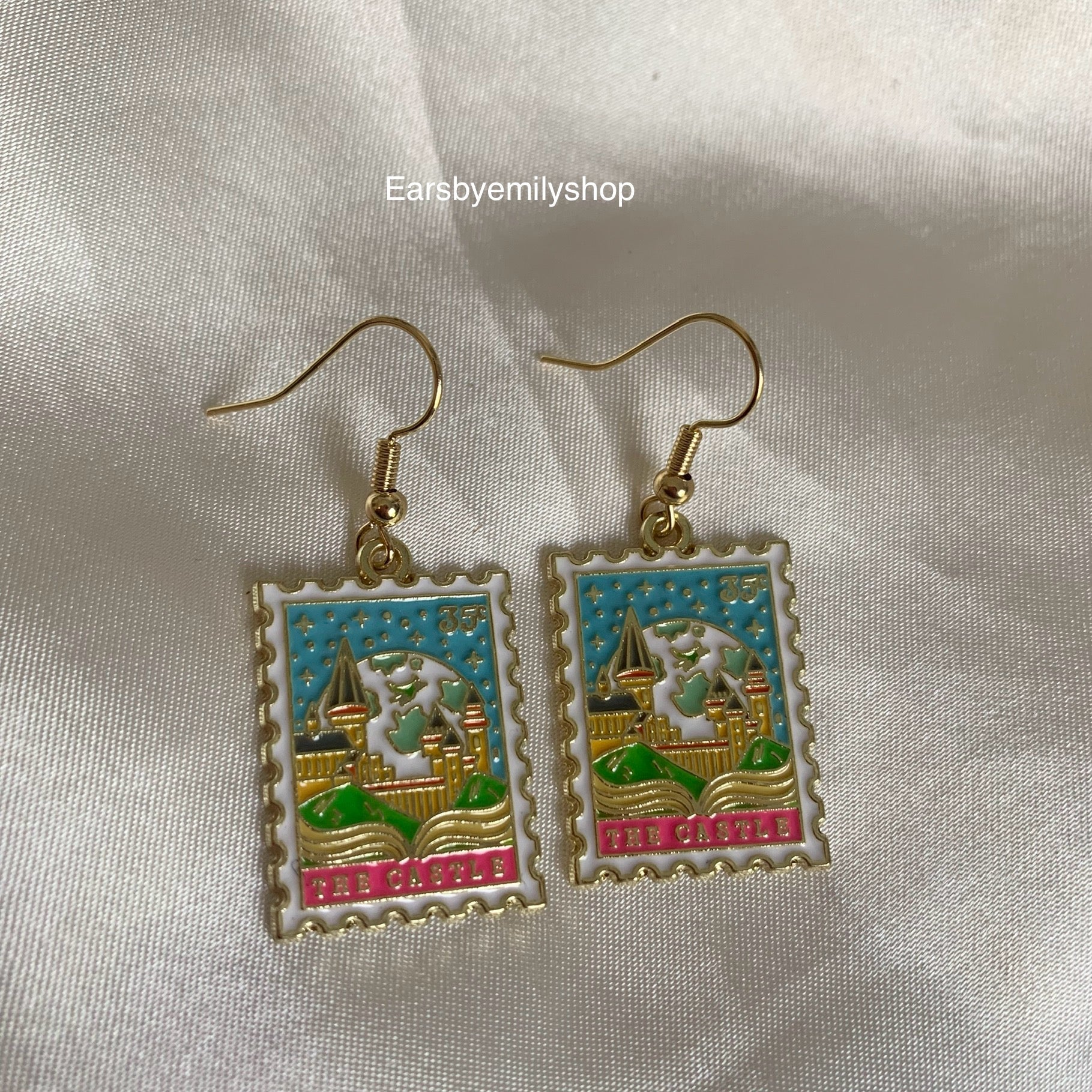Castle stamp dangle gold earrings