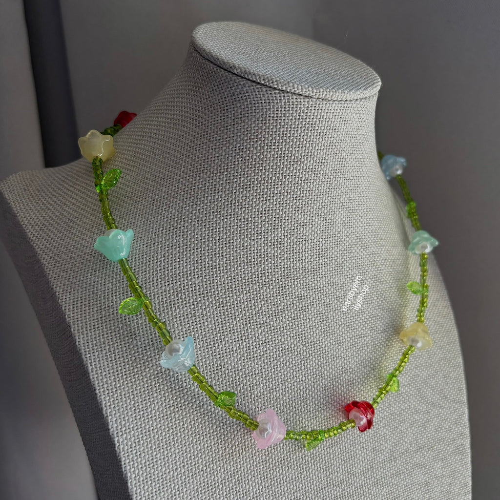 Cool green handmade beaded floral rainbow necklace