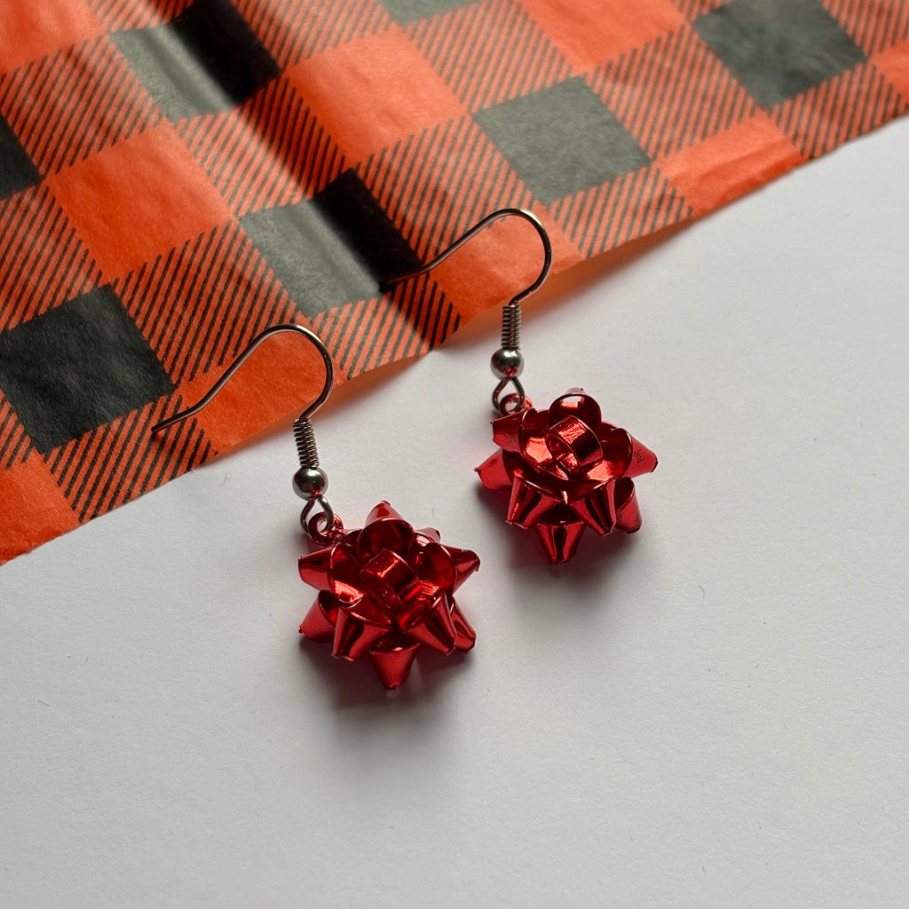 Colourful dangle Christmas fun quirky present bow earrings