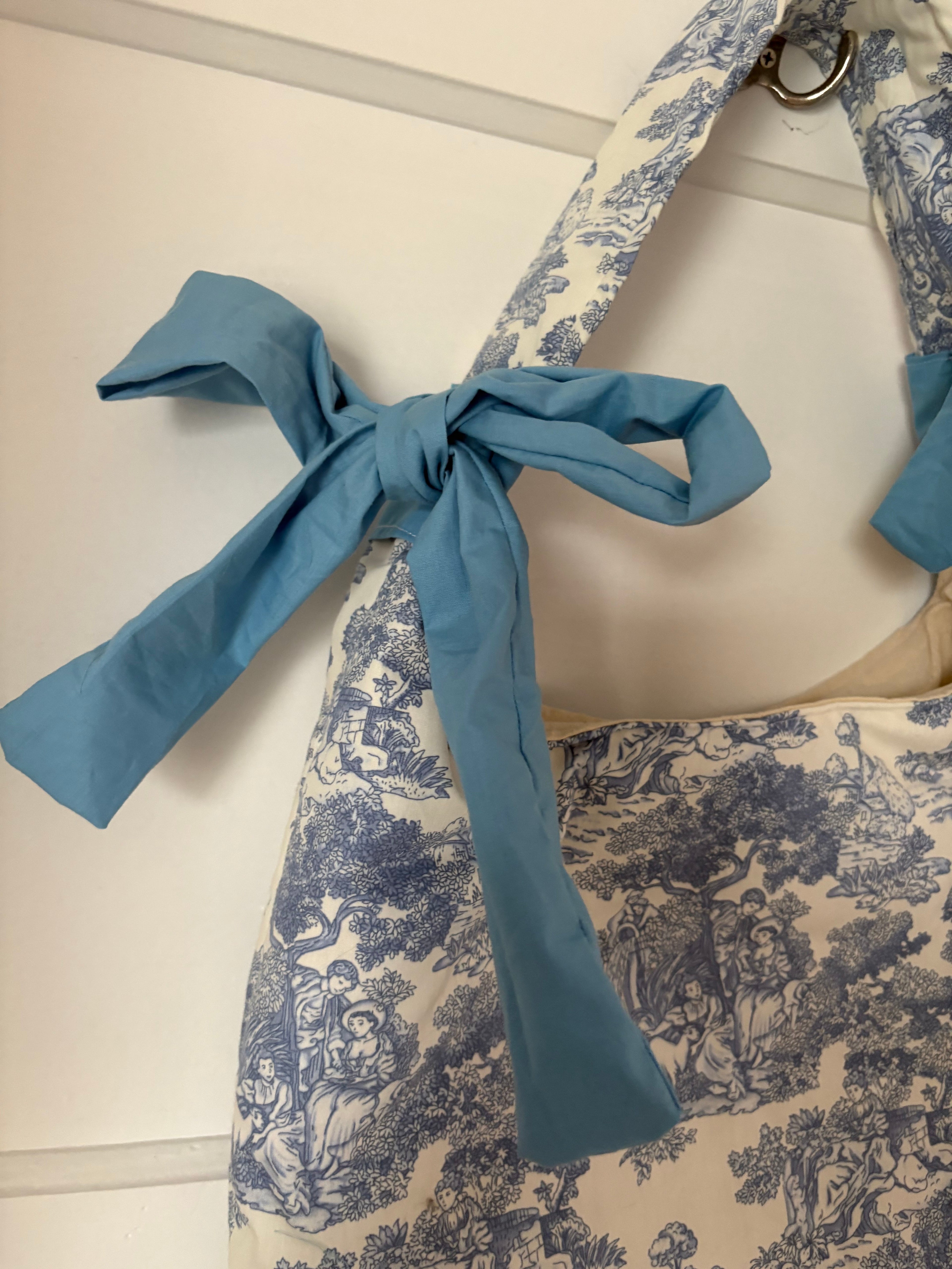 Handmade white and blue porcelain coquette farm print padded tote bag with blue bows