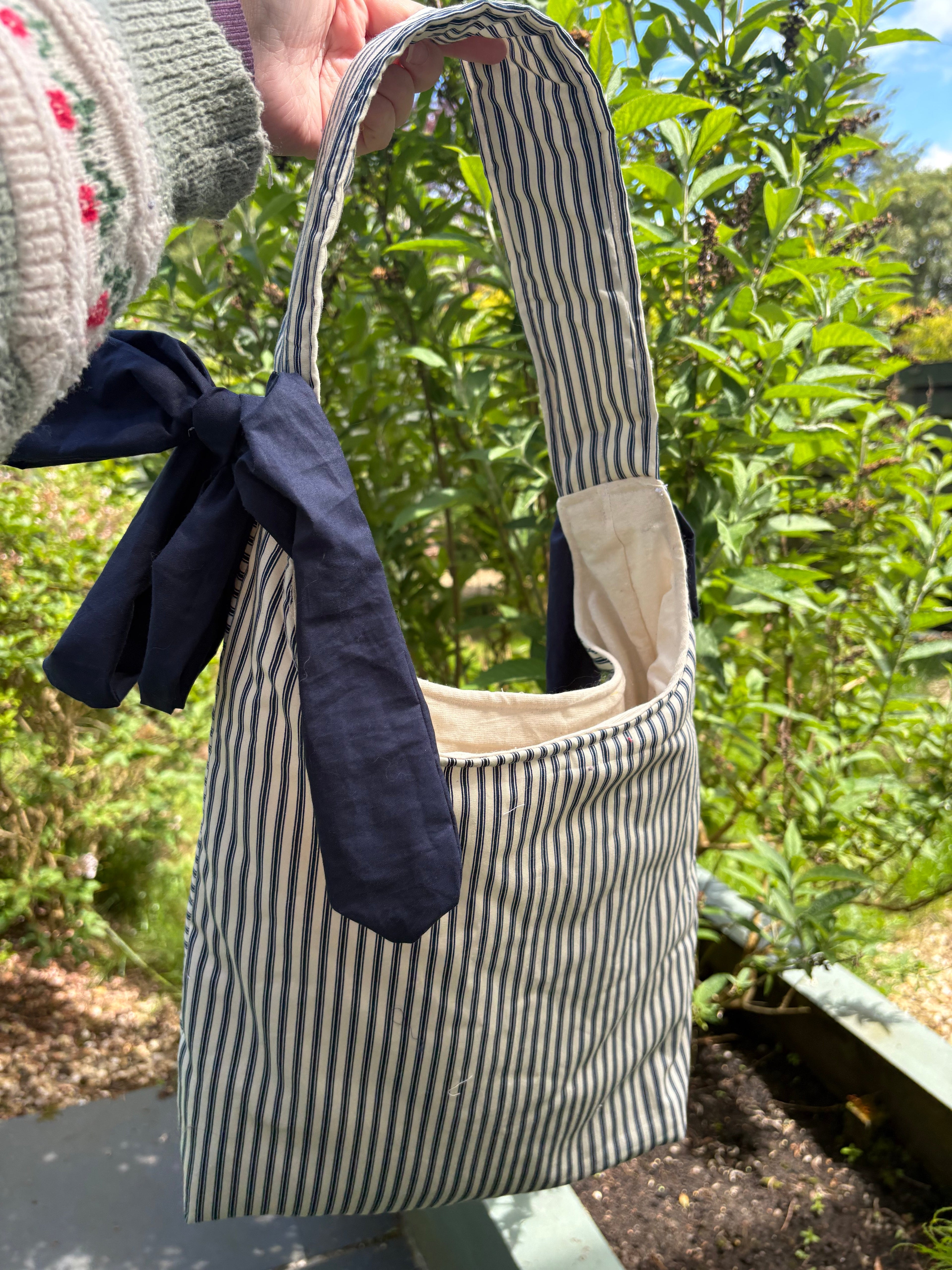 Handmade white and navy blue stripe coquette padded tote bag with bows