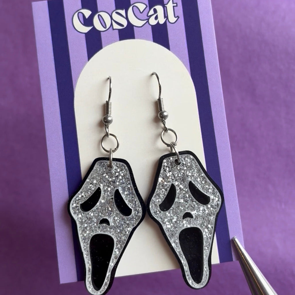 Black and glitter silver mask Halloween face scream horror earrings