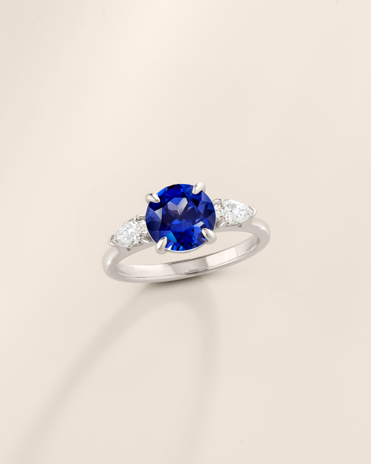 Blue Sapphire Round Cut Three Stone Engagement Ring in Sterling Silver