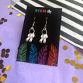 White spaceman astronaut silver drop dangle earrings