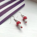 Cool quirky red and white glass mushroom lamp work drop dangle earrings on silver plated hooks.