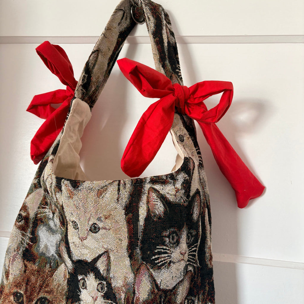 Handmade cool cat tapestry with red bow tote bag