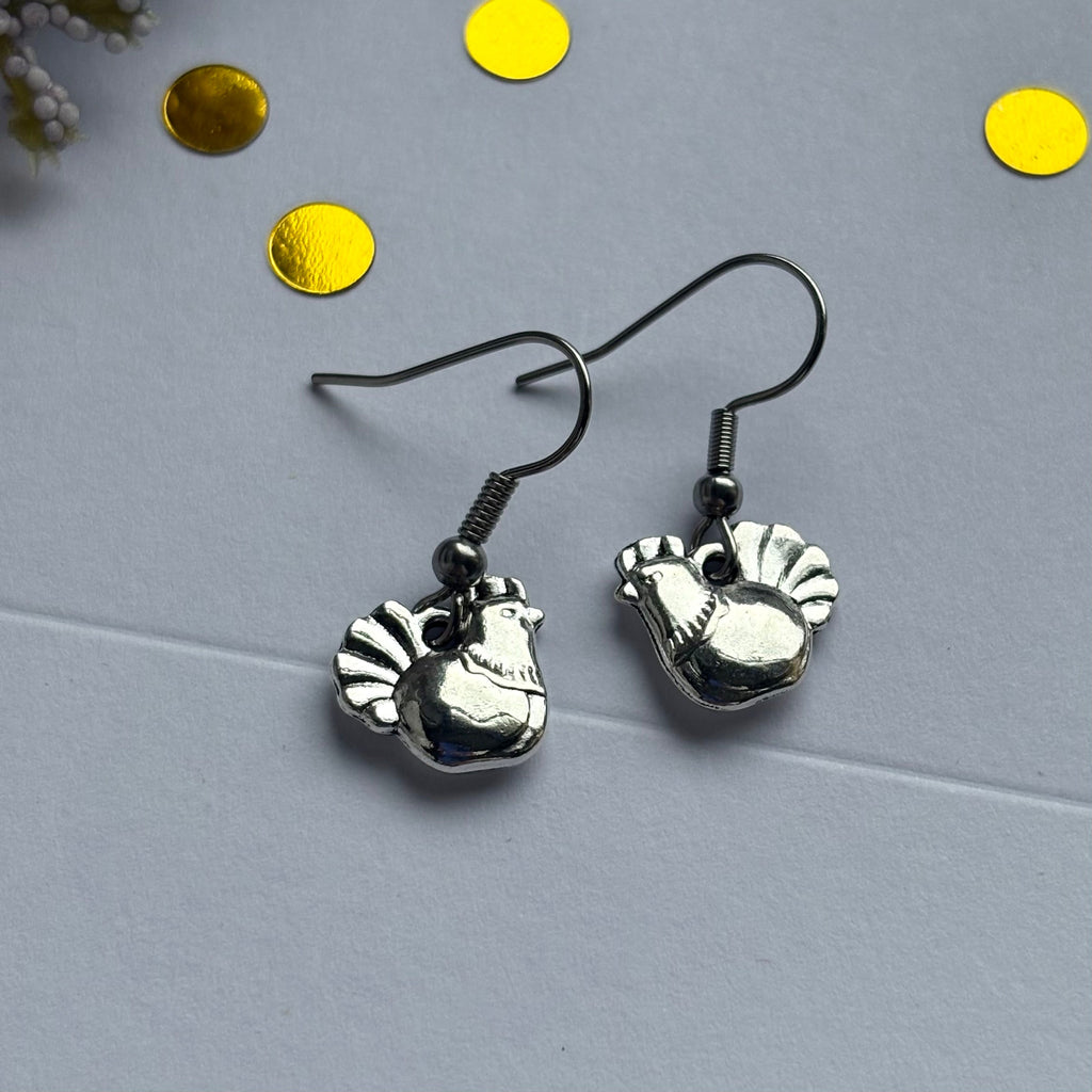 Silver chicken earrings on hypoallergenic hooks