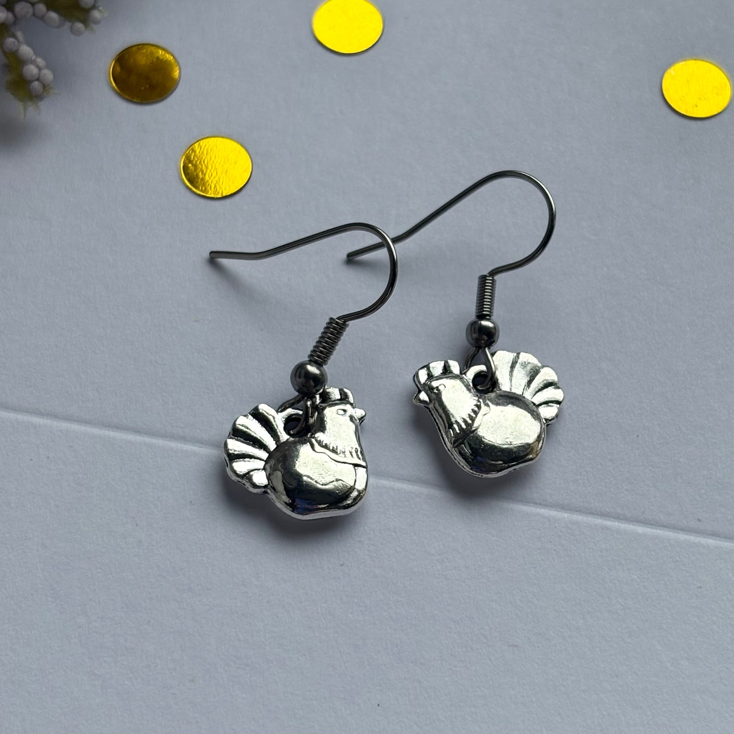 Silver chicken earrings on hypoallergenic hooks