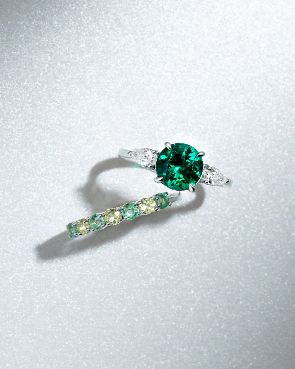 Emerald Round Cut Three Stone Engagement Ring in Sterling Silver