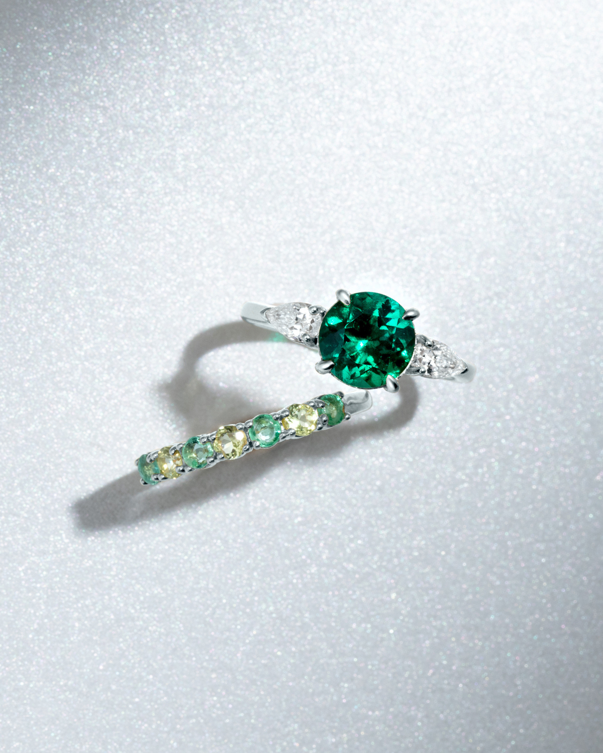 Emerald Round Cut Three Stone Engagement Ring in Sterling Silver