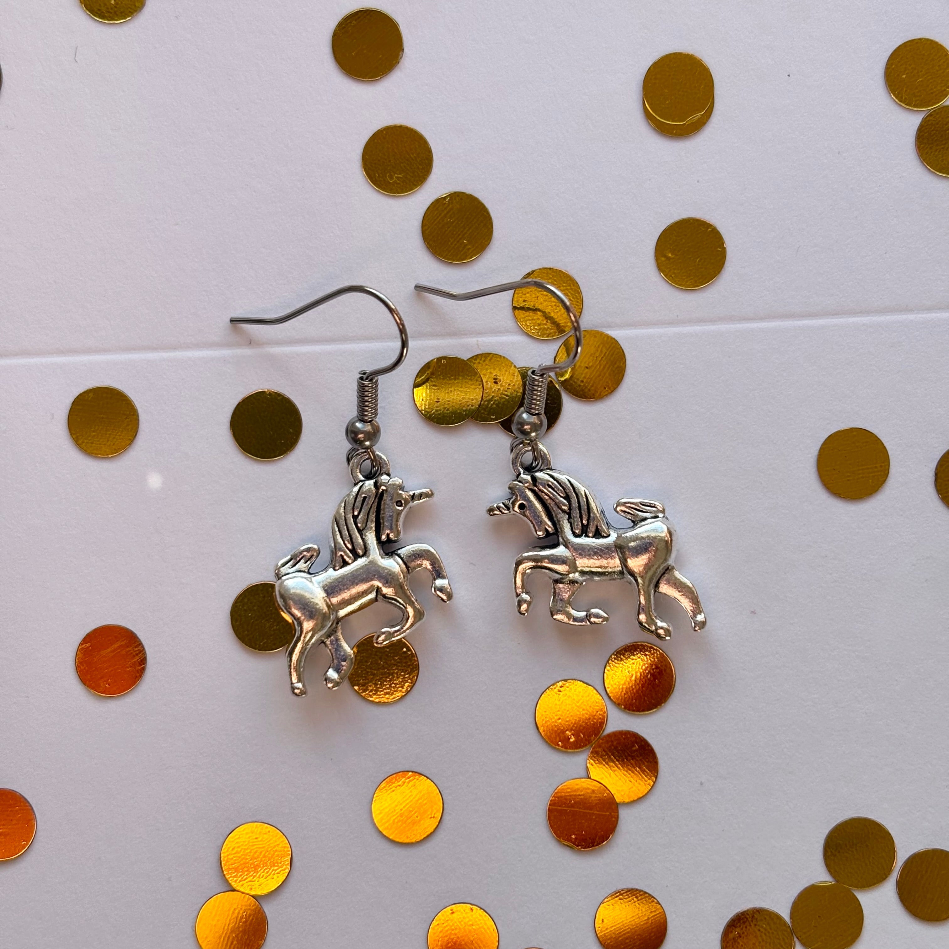 Silver Scottish unicorn earrings