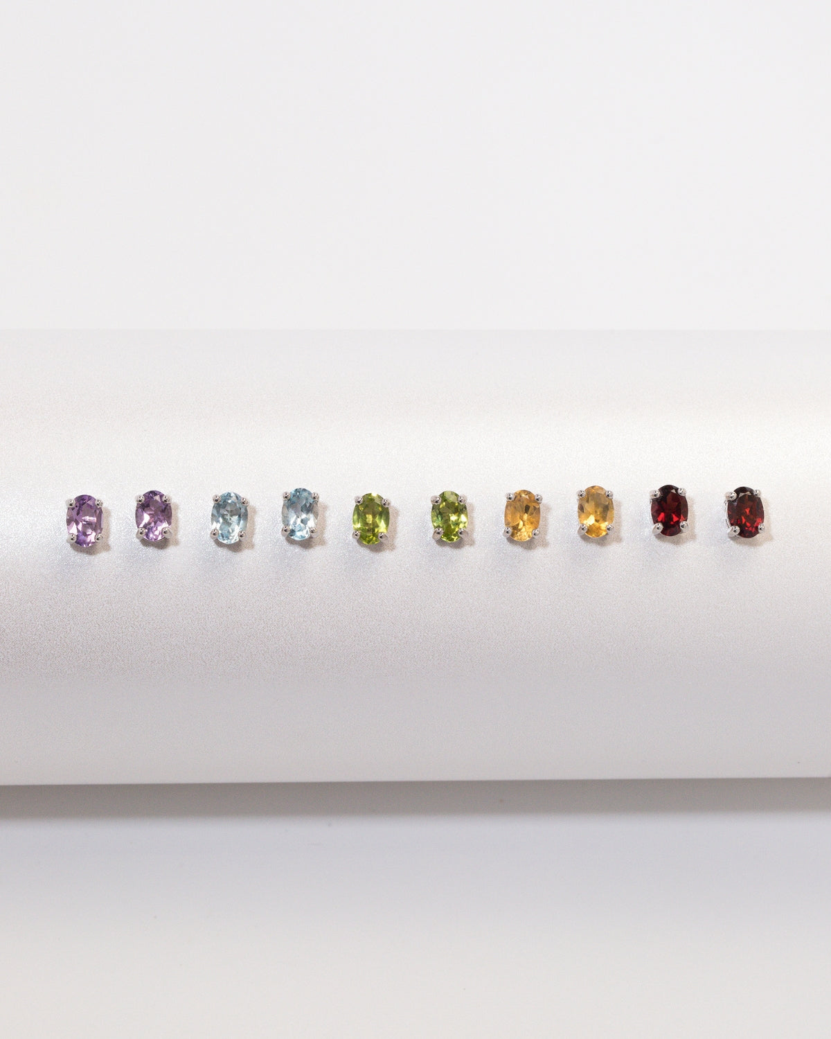 Garnet Oval Stud Earrings in Sterling Silver