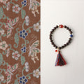 JEKIRA Black Gemstone & Ruby Tassel Bracelet