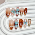 CTTHNBD Medium Almond Press-On Nails | Flower Gold Line Design, Ombre Brown, Size M