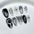 GLORS Gothic Long Almond Press-On Nails Set – Black & Silver Metallic with Butterfly Accent (10 Pieces)
