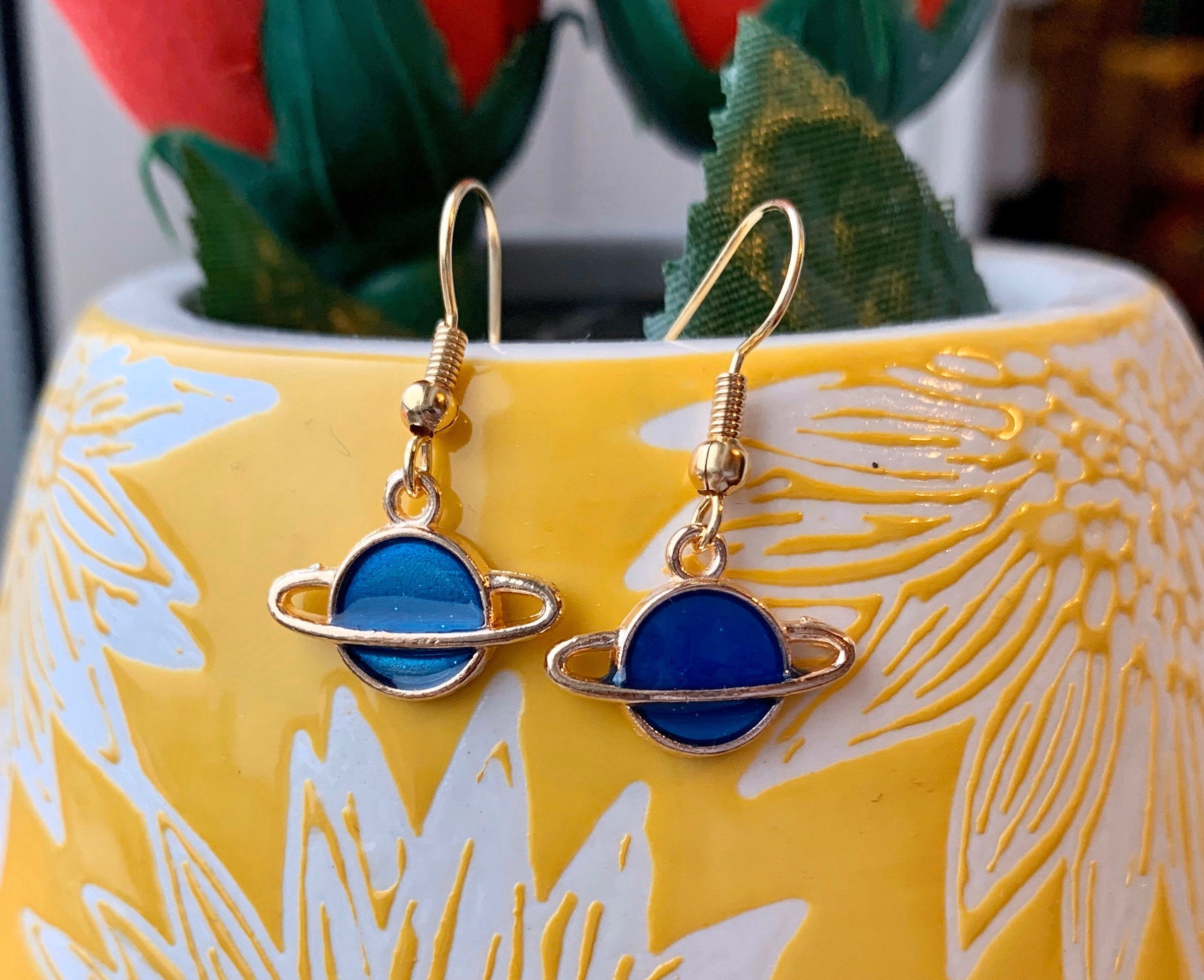 Cool quirky little blue or pink saturn planet drop dangle earrings