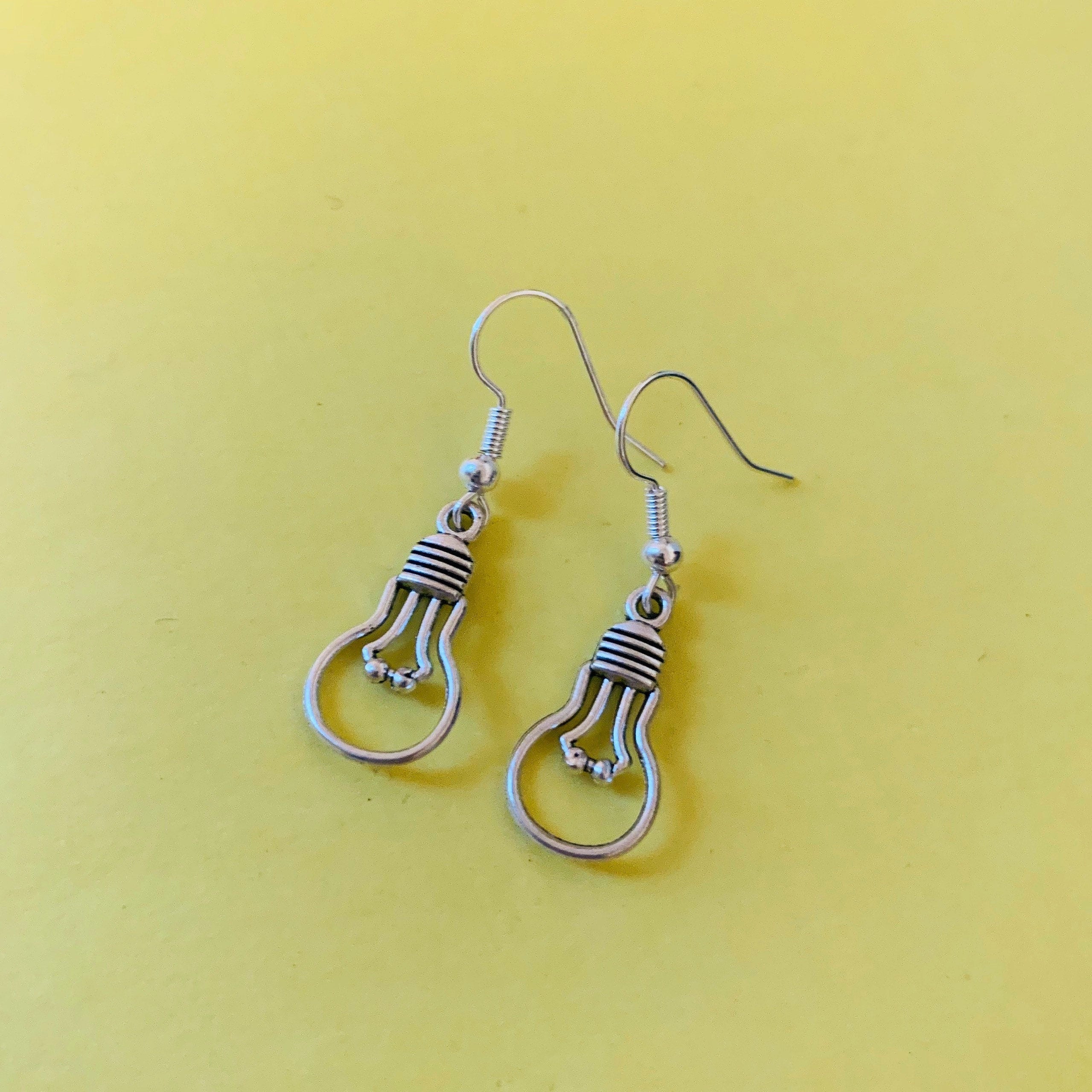 Silver light bulb dangle earrings