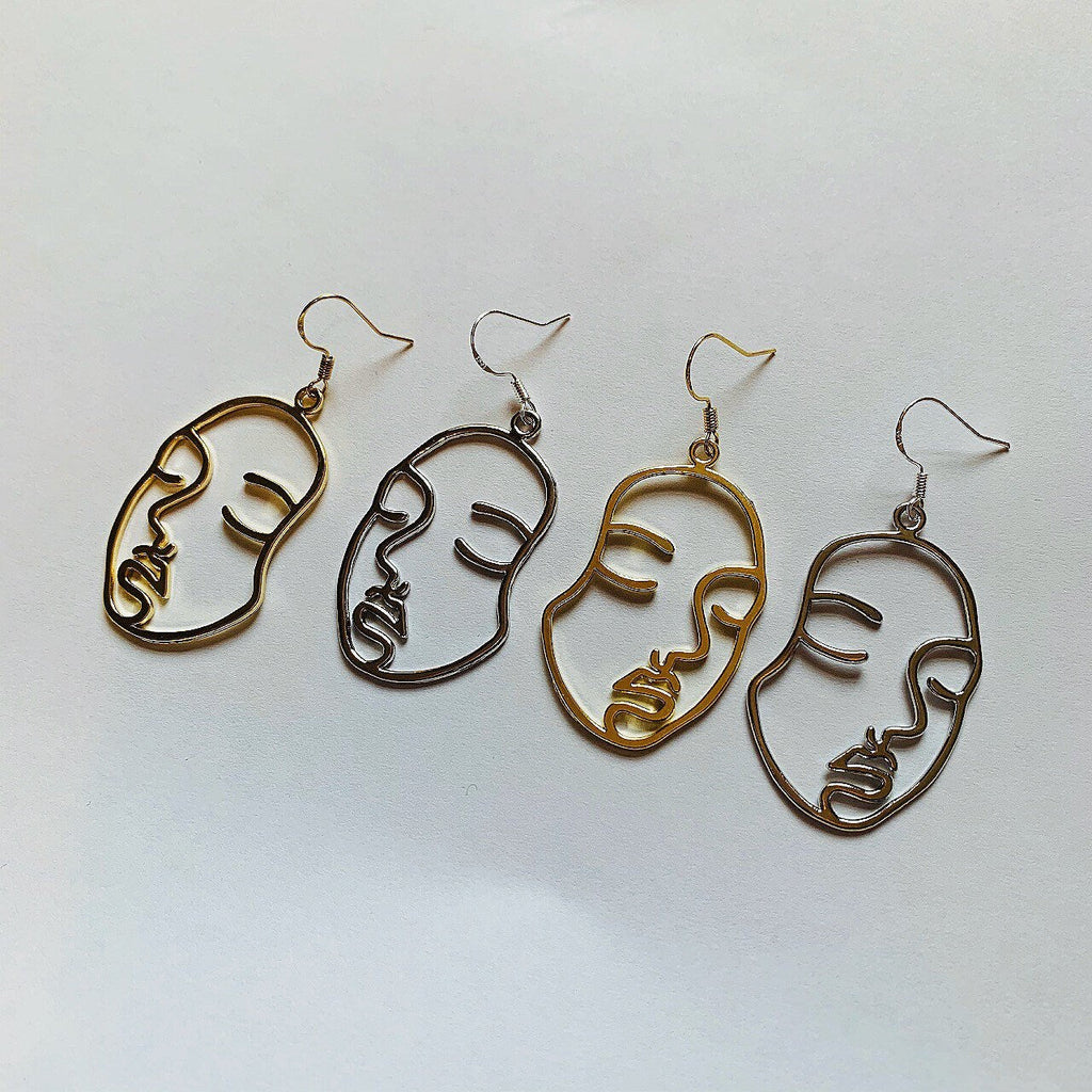 Silver or gold face outline earrings