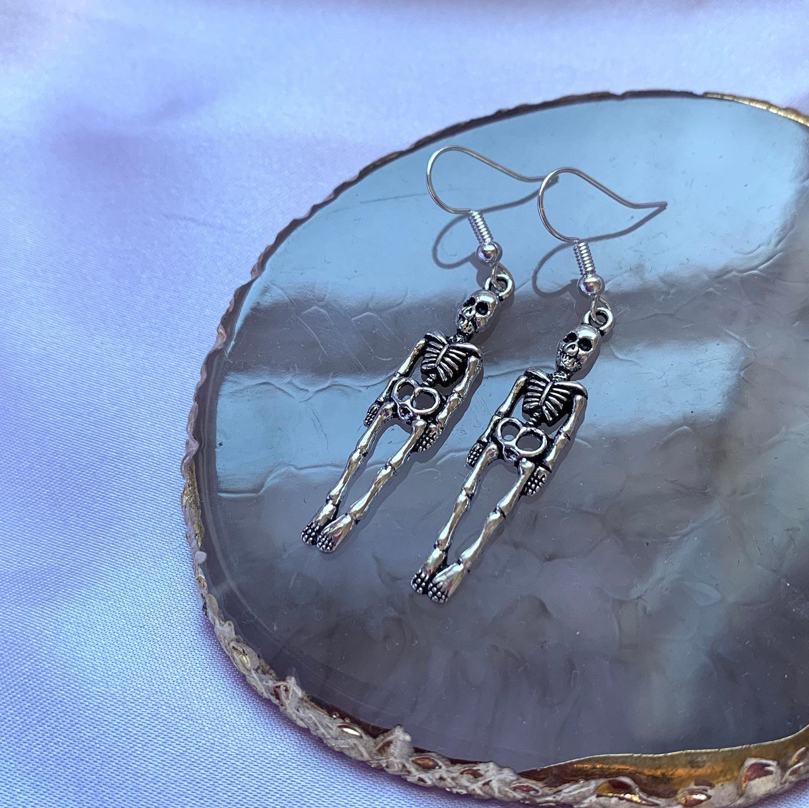 Silver skeleton halloween dangle earrings